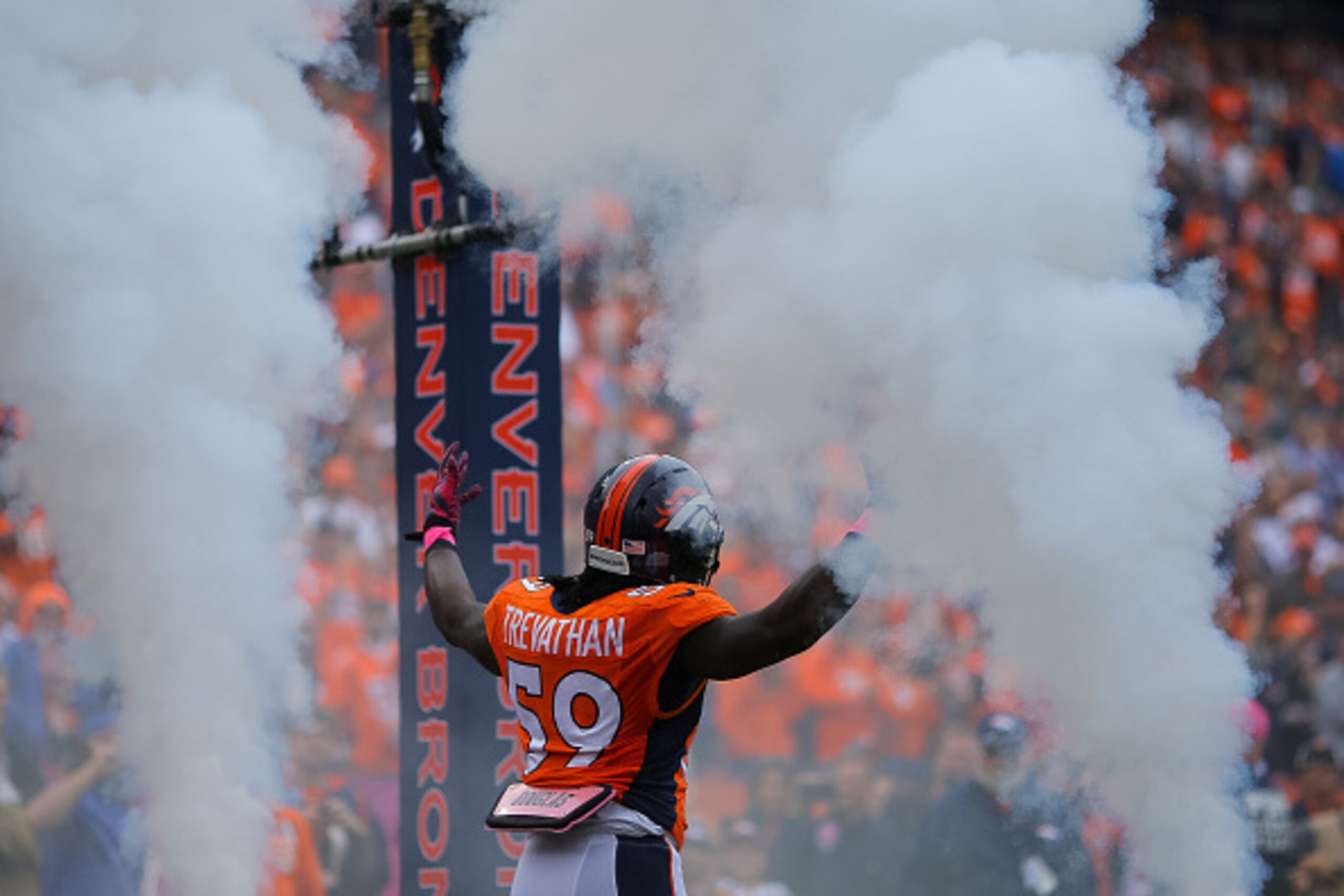 DENVER, CO - OCTOBER 4:  Inside linebacker Danny Trevathan #59 of the Denver Broncos emerges from the tunnel during player introductions before a game against the Minnesota Vikings at Sports Authority Field at Mile High on October 4, 2015 in Denver, Color