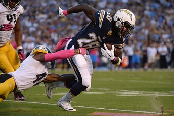 SAN DIEGO, CA - OCTOBER 12:  Running back Melvin Gordon #28 of the San Diego Chargers is tackled by cornerback Antwon Blake #41 of the Pittsburgh Steelers at Qualcomm Stadium on October 12, 2015 in San Diego, California.  (Photo by Donald Miralle/Getty Im