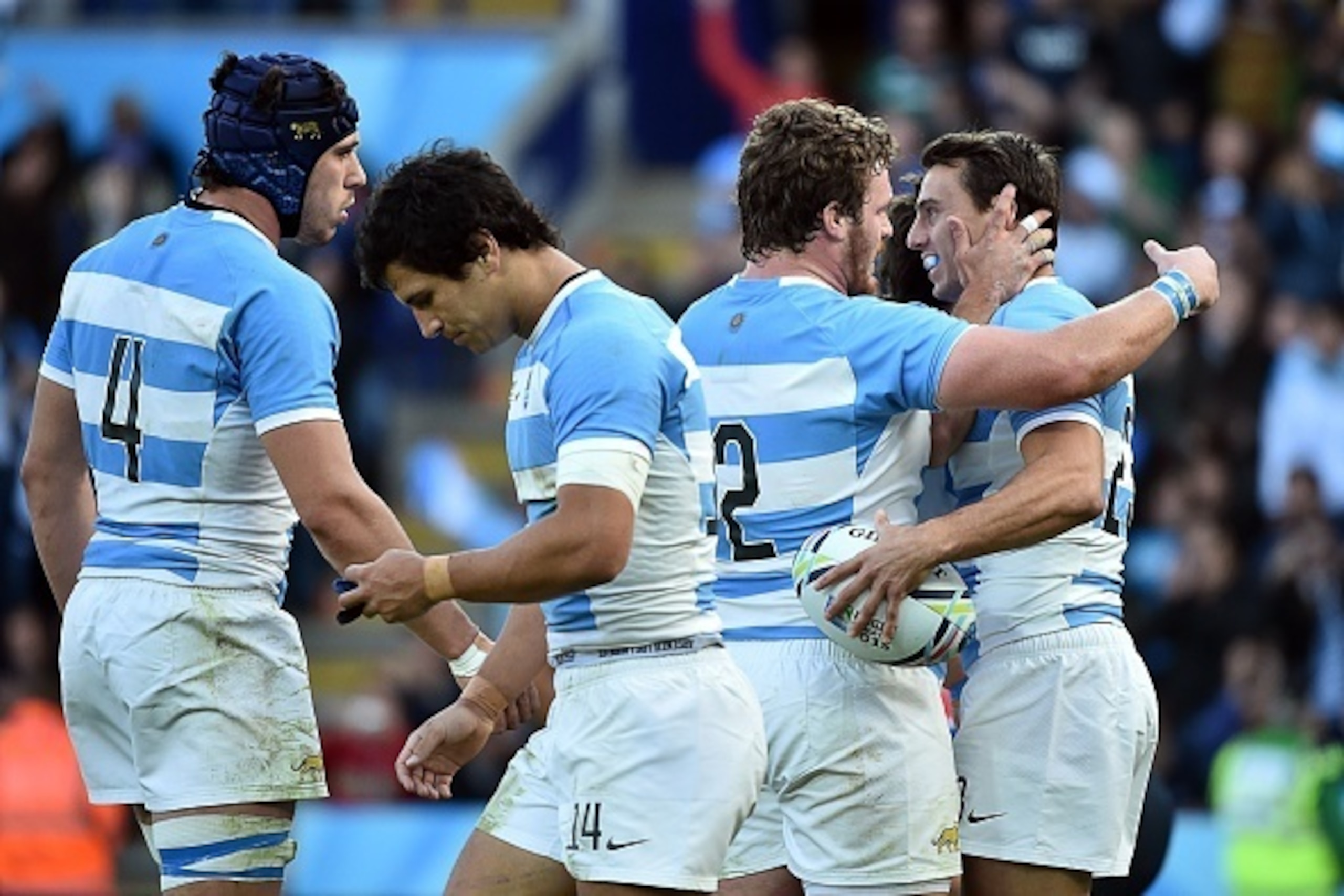 Argentina's wing Juan Imhoff (R) celebrates after scoring his team's ninth try  during a Pool C match of the 2015 Rugby World Cup between Argentina and Namibia at Leicester City Stadium in Leicester, central England, on October 11, 2015.  AFP PHOTO / BERT