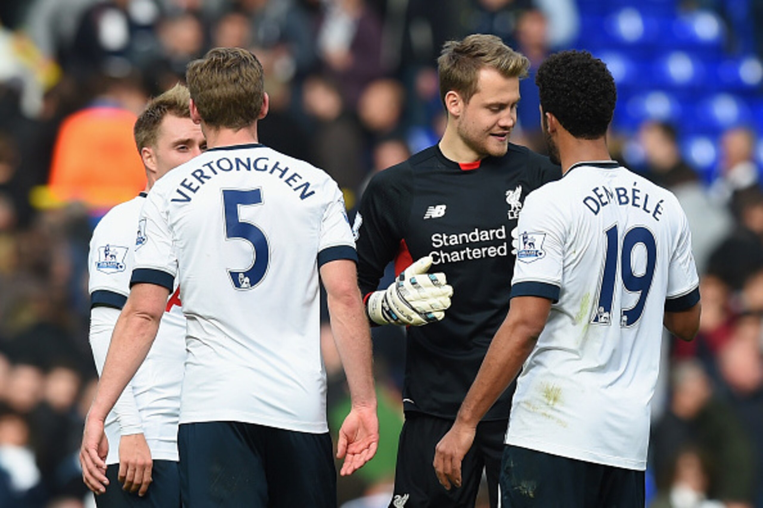 LONDON, ENGLAND - OCTOBER 17:  Simon Mignolet (2nd R) of Liverpool shakes hands with Mousa Dembele (1st R) of Tottenham Hotspur after the 1-1 draw in the Barclays Premier League match between Tottenham Hotspur and Liverpool at White Hart Lane on October 1