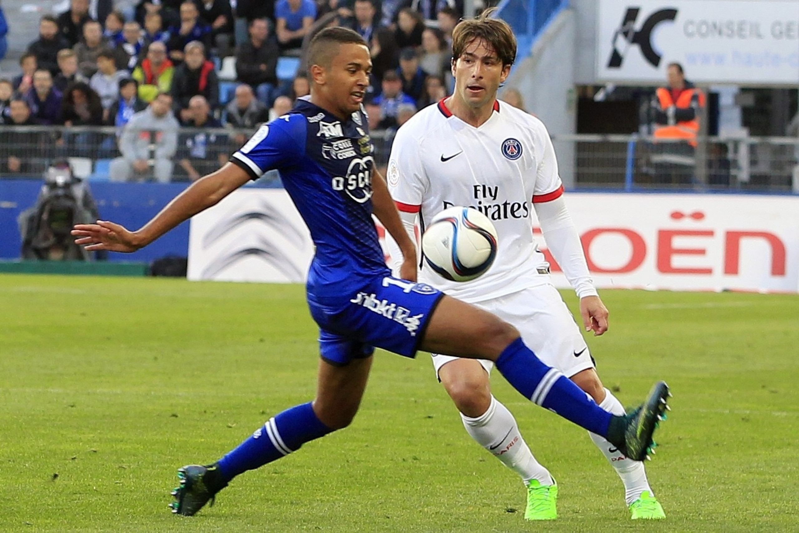 Paris Saint-Germain's Brazilian defender Maxwell (R) vies with Bastia's French midfielder Axel Ngando during the L1 football match Bastia (SCB) against Paris (PSG) on October 17, 2015, at the Armand Cesari stadium in Bastia, on the French Mediterranean is