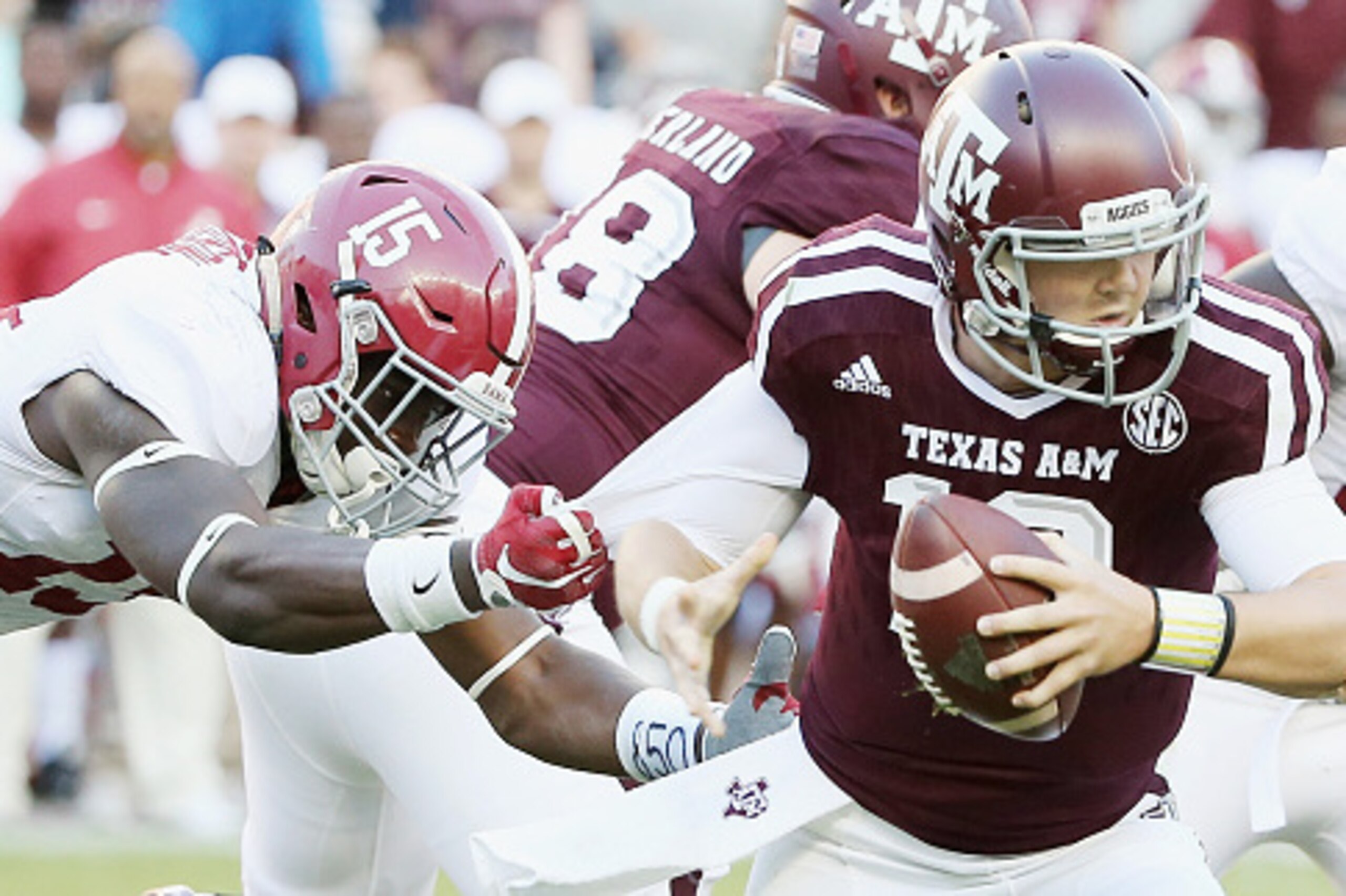 COLLEGE STATION, TX - OCTOBER 17: Ronnie Harrison #15 of the Alabama Crimson Tide tackles Kyle Allen #10 of the Texas A&M Aggies in the second half of their game at Kyle Field on October 17, 2015 in College Station, Texas. (Photo by Scott Halleran/Getty COLLEGE STATION, TX - OCTOBER 17: Ronnie Harrison #15 of the Alabama Crimson Tide tackles Kyle Allen #10 of the Texas A&M Aggies in the second half of their game at Kyle Field on October 17, 2015 in College Station, Texas. (Photo by Scott Halleran/Getty