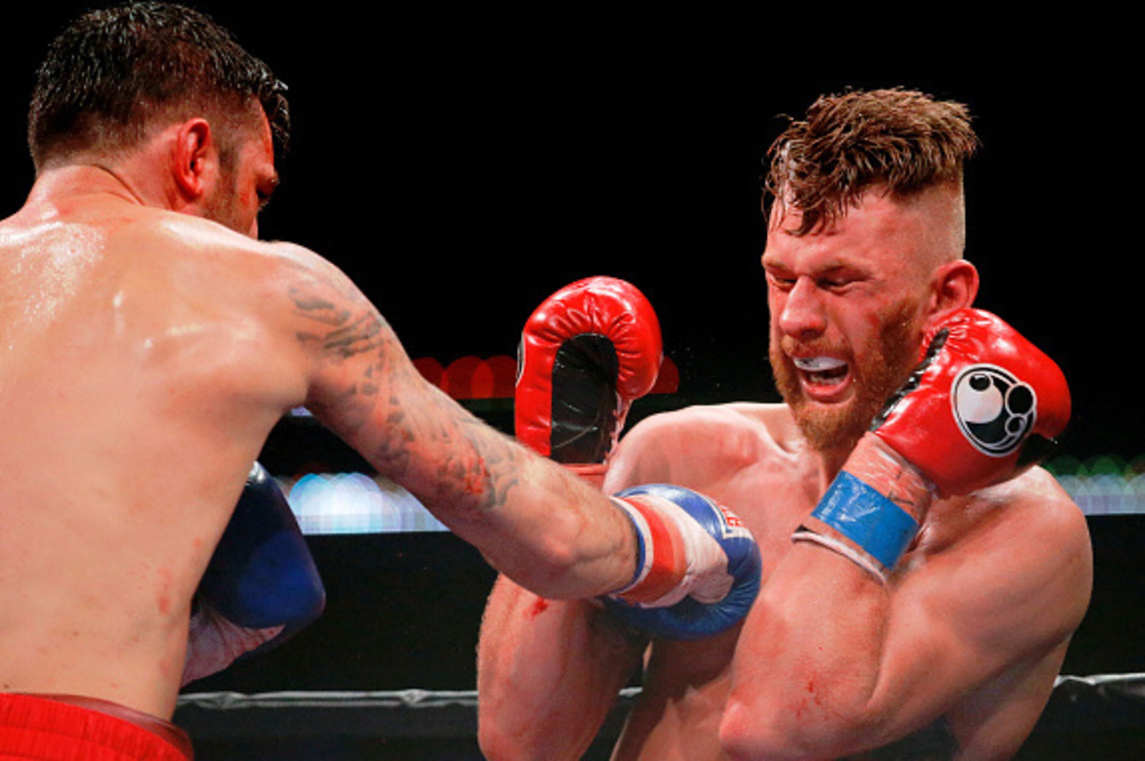 CHICAGO, IL - OCTOBER 16:  Nathan Cleverly (L) throws a right at Andrzej Fonfara (R) during their Main Event: Light Heavyweights fight at UIC Pavilion on October 16, 2015 in Chicago, Illinois. Andrzej Fonfara won by unanimous decision.  (Photo by Jon Durr