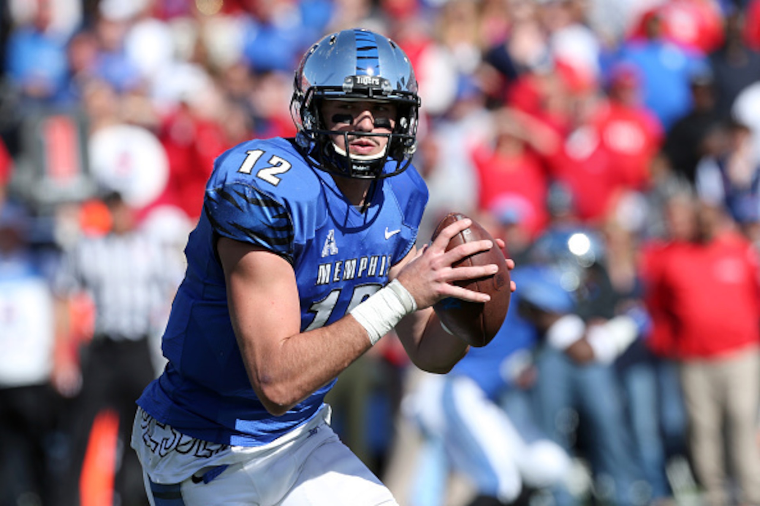 MEMPHIS, TN - OCTOBER 17: Paxton Lynch #12 of the Memphis Tigers runs with the ball against the Mississippi Rebels on October 17, 2015 at Liberty Bowl Memorial Stadium in Memphis, Tennessee. Memphis defeated Mississippi 37-24. (Photo by Joe Murphy/Getty I