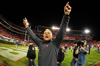 ATHENS, GA - OCTOBER 17: Head Coach Mark Richt of the Georgia Bulldogs celebrates with fans after the game against the Missouri Tigers on October 17, 2015 in Atlanta, Georgia. Photo by Scott Cunningham/Getty Images)