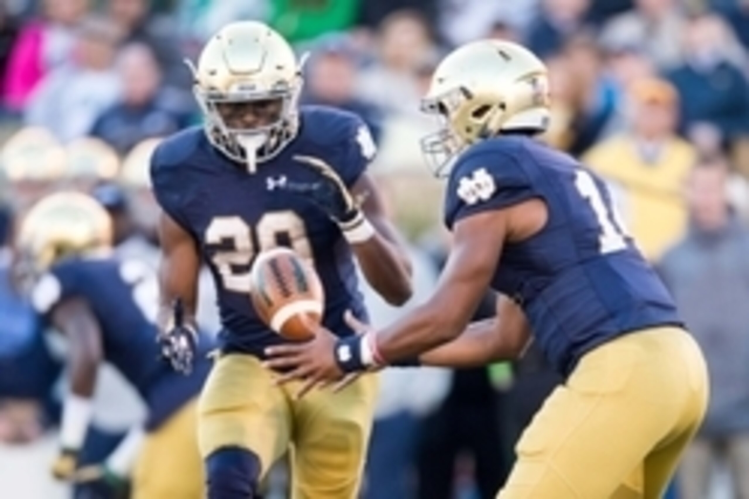 Oct 10, 2015; South Bend, IN, USA; Notre Dame Fighting Irish quarterback DeShone Kizer (14) pitches the ball to running back C.J. Prosise (20) in the third quarter against the Navy Midshipmen at Notre Dame Stadium. Notre Dame won 41-24. Mandatory Credit: 