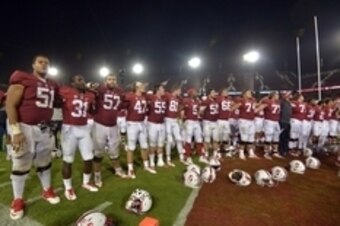 Oct 15, 2015; Stanford, CA, USA; Stanford Cardinal players celebrate after 56-35 victory against the UCLA Bruins in a NCAA football game at Stanford Stadium. Mandatory Credit: Kirby Lee-USA TODAY Sports