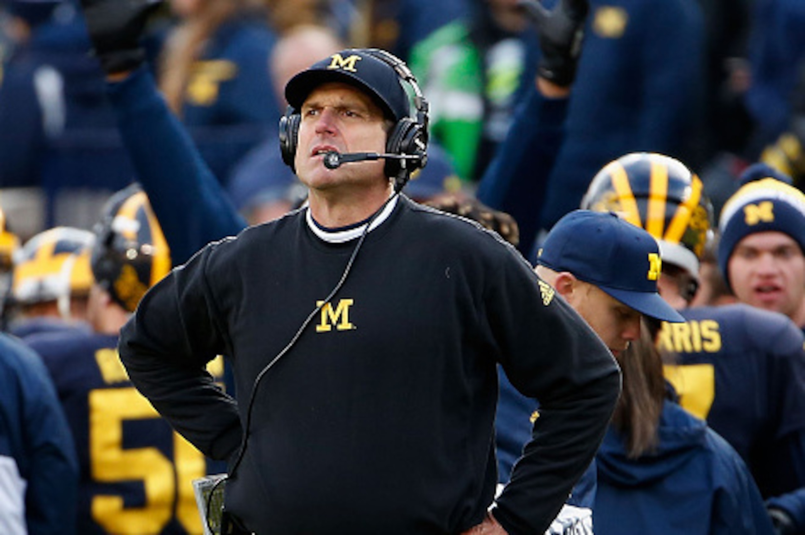 ANN ARBOR, MI - OCTOBER 17: Head coach Jim Harbaugh of the Michigan Wolverines reacts on the sidlines during the second quarter of the college football game against the Michigan State Spartans at Michigan Stadium on October 17, 2015 in Ann Arbor, Michiga ANN ARBOR, MI - OCTOBER 17: Head coach Jim Harbaugh of the Michigan Wolverines reacts on the sidlines during the second quarter of the college football game against the Michigan State Spartans at Michigan Stadium on October 17, 2015 in Ann Arbor, Michiga