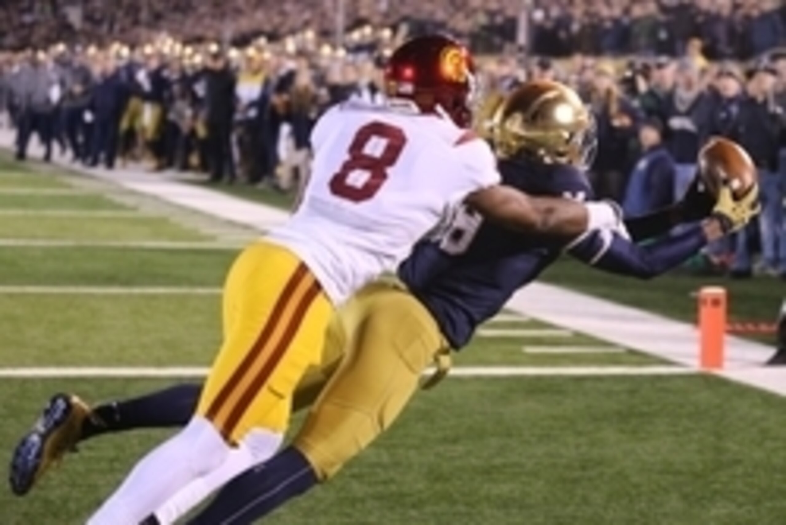 Oct 17, 2015; South Bend, IN, USA; Notre Dame Fighting Irish wide receiver Korey Robinson (88) catches a pass in the end zone for a touchdown against Southern California Trojans cornerback Iman Marshall (8) at Notre Dame Stadium. Notre Dame defeats Southe