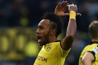 Dortmund's Gabonese striker Pierre-Emerick Aubameyang celebrates scoring during the German first division Bundesliga football match Borussia Dortmund v SV Darmstadt 98, in Dortmund, western Germany, on September 27, 2015. AFP PHOTO / PATRIK STOLLARZ
REST Dortmund's Gabonese striker Pierre-Emerick Aubameyang celebrates scoring during the German first division Bundesliga football match Borussia Dortmund v SV Darmstadt 98, in Dortmund, western Germany, on September 27, 2015. AFP PHOTO / PATRIK STOLLARZ
REST