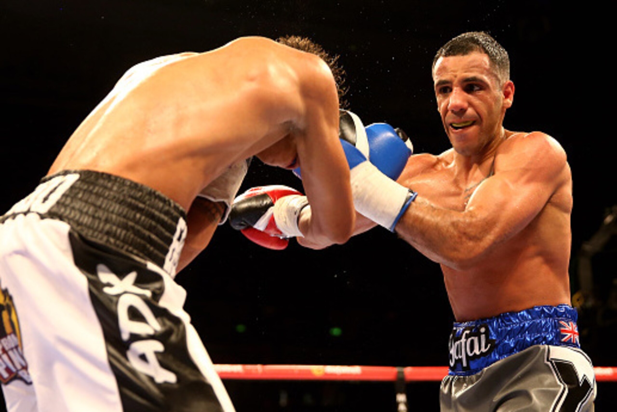SHEFFIELD, ENGLAND - MARCH 28:  Kal Yafai (R) of Great Britain lands a blow on Cristofer Rosales of Nicaragua during a flyweight contest at Motorpoint Arena on March 28, 2015 in Sheffield, England.  (Photo by Richard Heathcote/Getty Images)