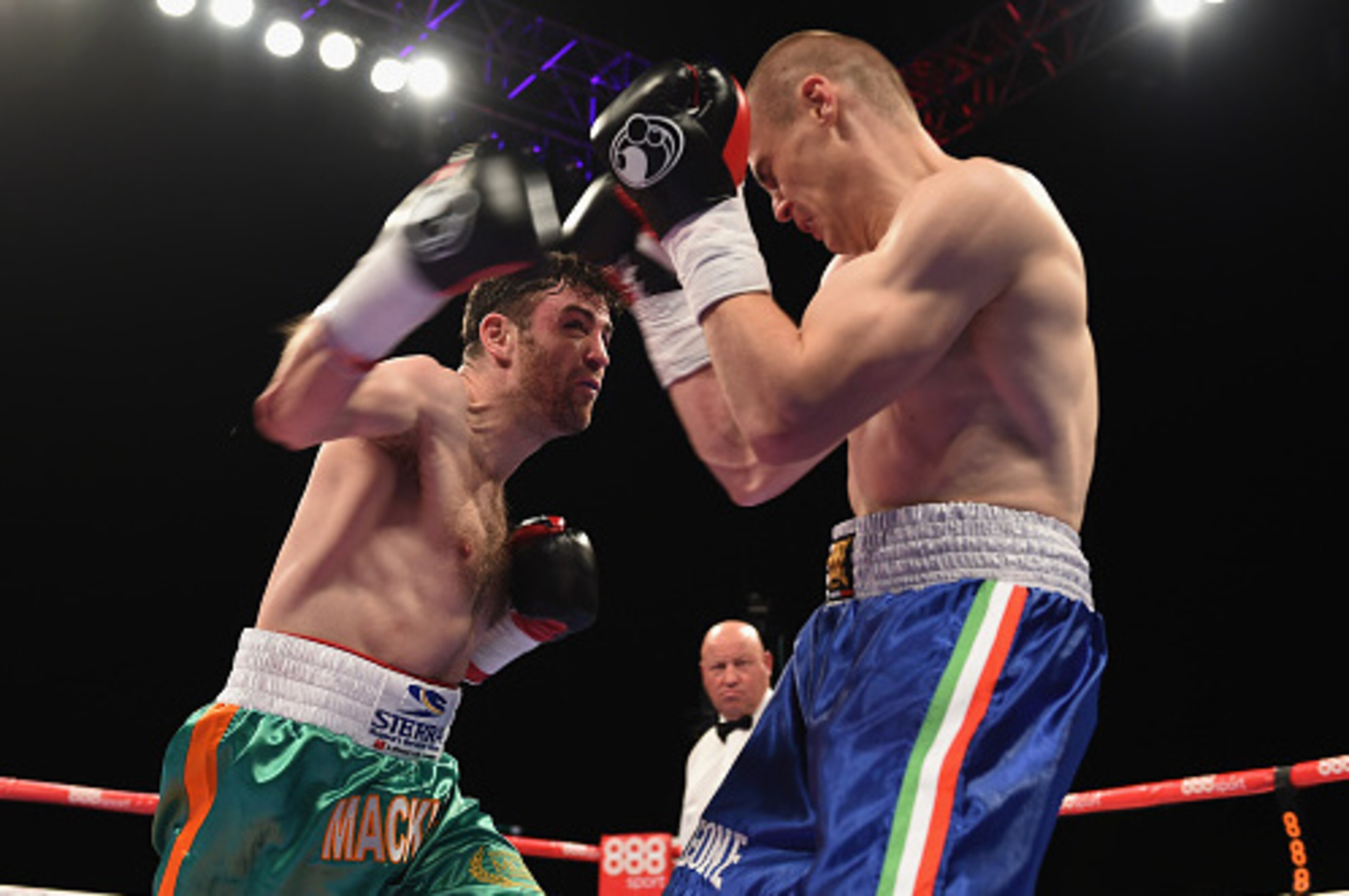 BIRMINGHAM, ENGLAND - MAY 09:  Matthew Macklin (Green Shorts) in action as he beats Sandor Micsko (Blue Shorts) during the Middleweight Contest during Resurrection Fight Night at Barclaycard Arena on May 9, 2015 in Birmingham, England.  (Photo by Christop