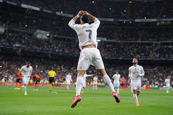 MADRID, SPAIN - SEPTEMBER 15:  Cristiano Ronaldo of Real Madrid celebrates after scoring Real's 3rd goal from the penalty spot during the UEFA Champions League Group A match between Real Madrid and Shakhtar Donetsk at estadio Santiago Bernabeu on Septembe
