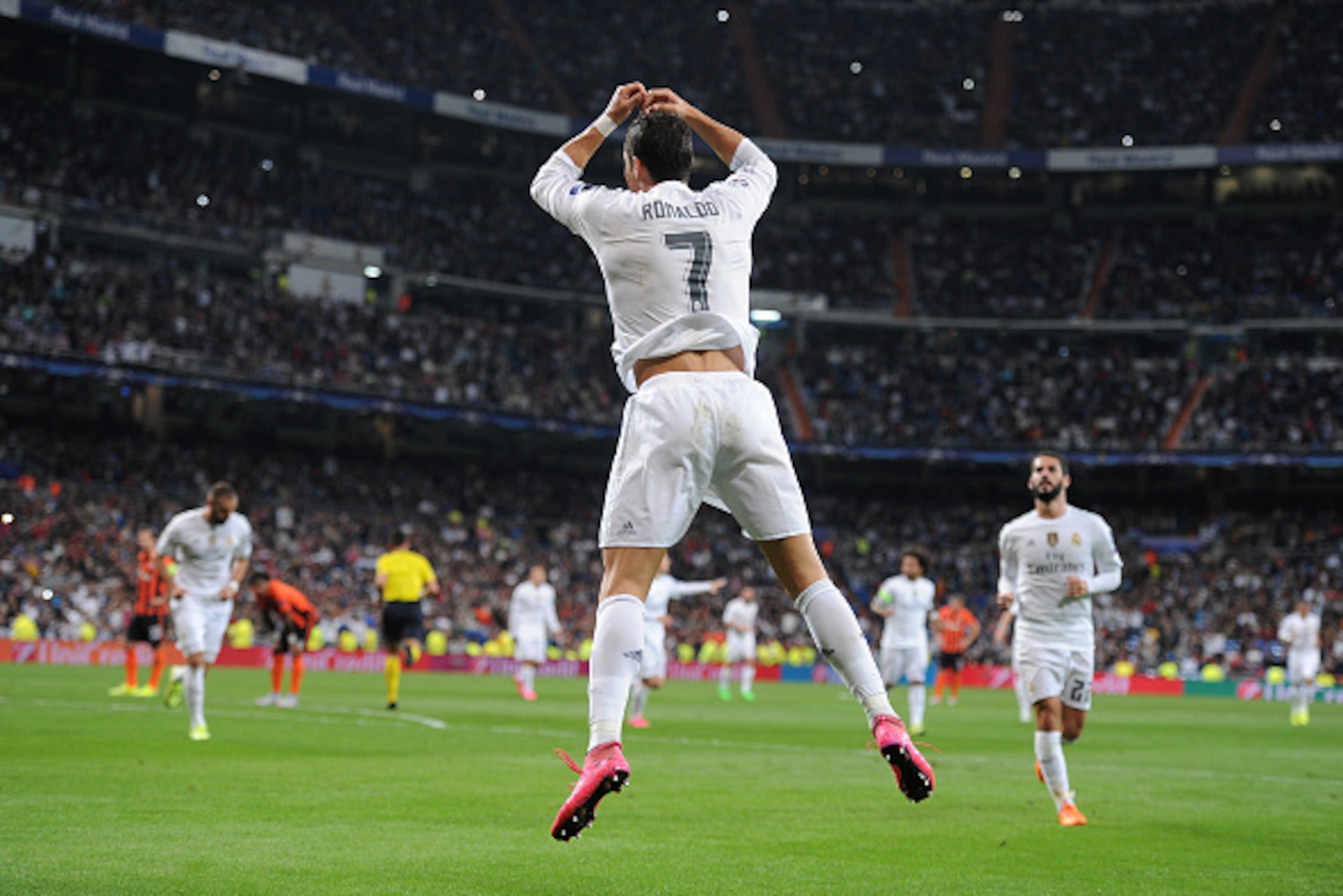 MADRID, SPAIN - SEPTEMBER 15:  Cristiano Ronaldo of Real Madrid celebrates after scoring Real's 3rd goal from the penalty spot during the UEFA Champions League Group A match between Real Madrid and Shakhtar Donetsk at estadio Santiago Bernabeu on Septembe
