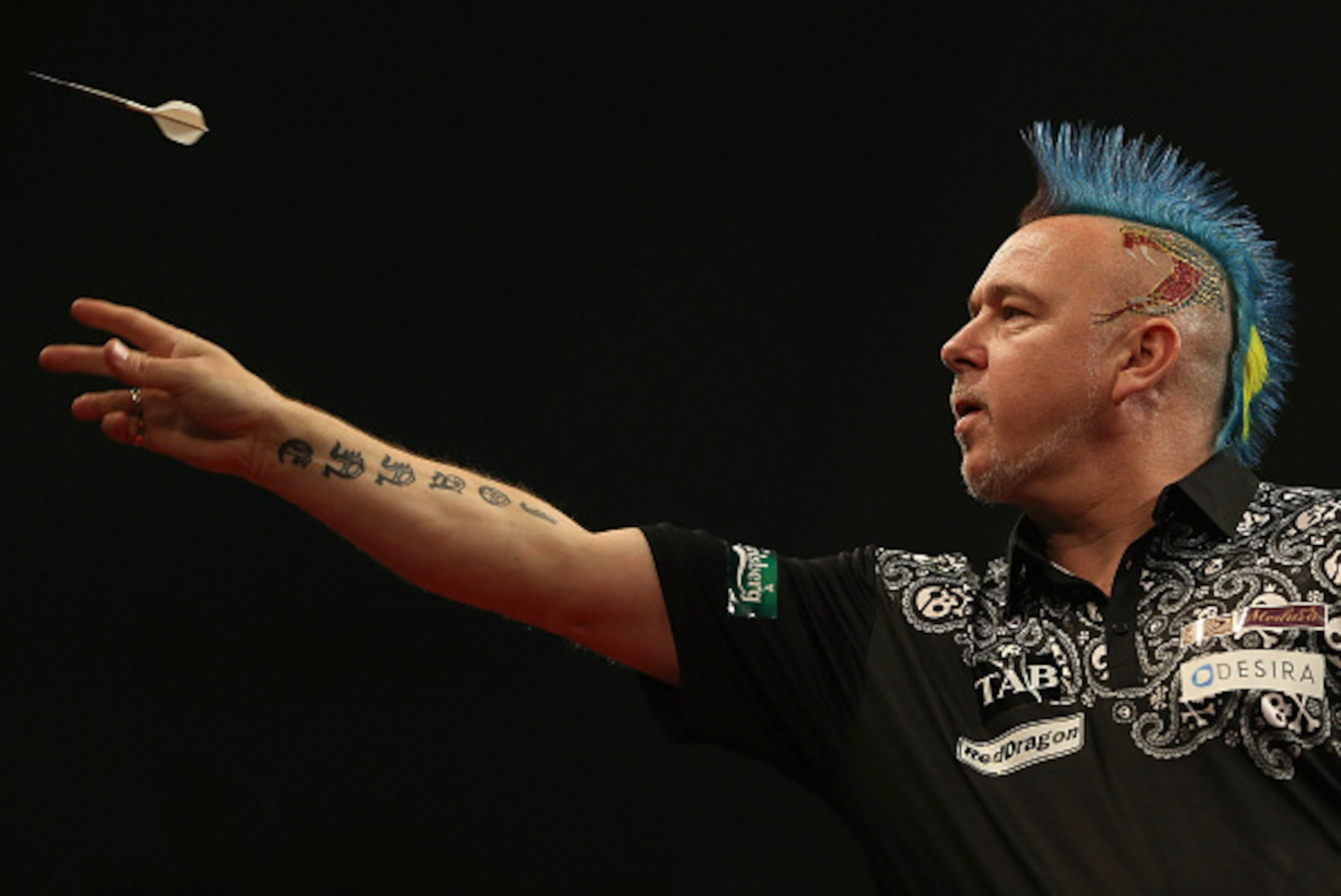 AUCKLAND, NEW ZEALAND - AUGUST 29:  Peter Wright in action during the Auckland Darts Masters at The Trusts Arena on August 29, 2015 in Auckland, New Zealand.  (Photo by Michael Bradley/Getty Images)