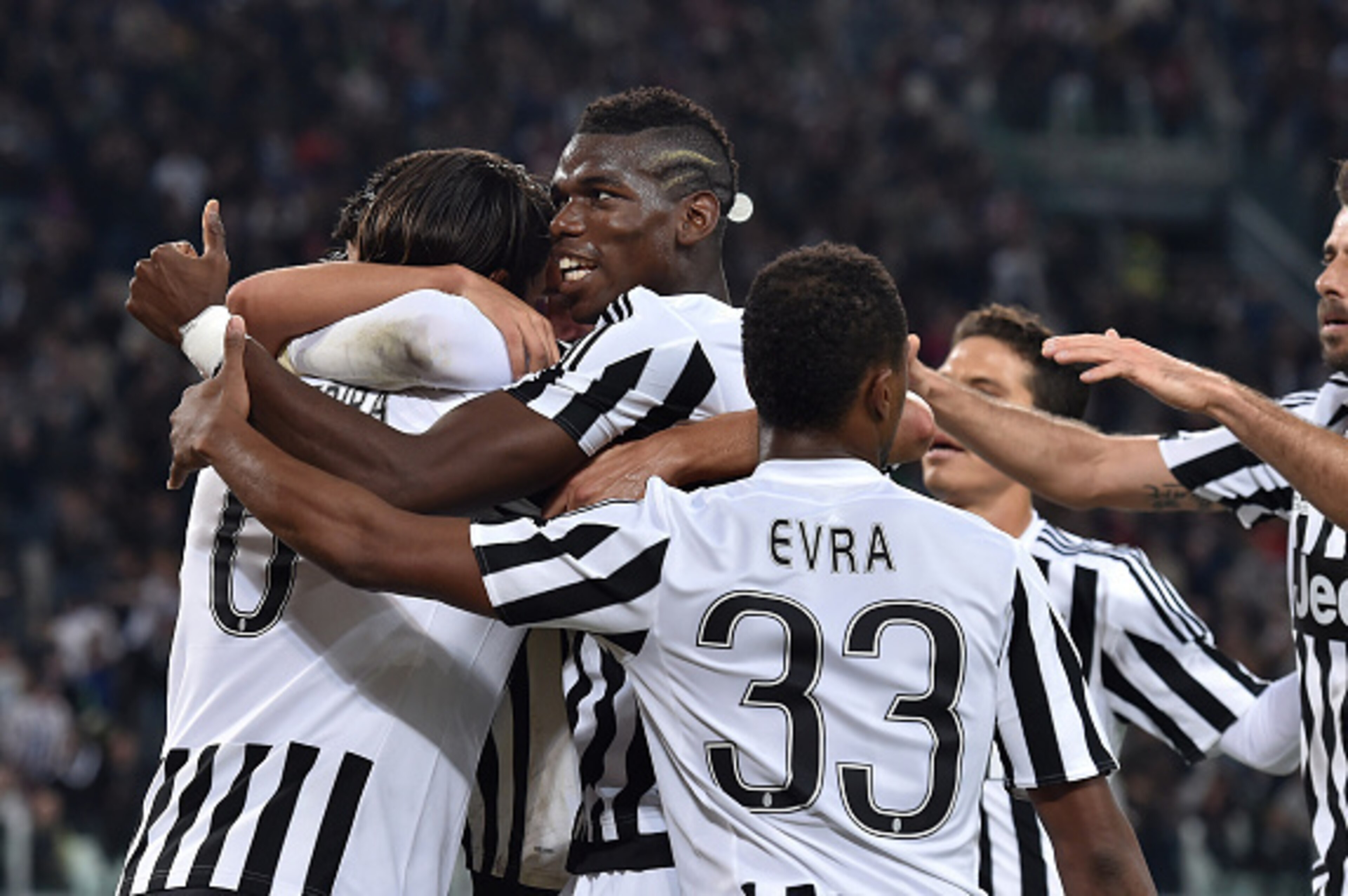 TURIN, ITALY - OCTOBER 04: Paulo Dybala (C) of Juventus FC celebrates his goal with team mates during the Serie A match between Juventus FC and Bologna FC at Juventus Arena on October 4, 2015 in Turin, Italy. (Photo by Valerio Pennicino/Getty Images) TURIN, ITALY - OCTOBER 04: Paulo Dybala (C) of Juventus FC celebrates his goal with team mates during the Serie A match between Juventus FC and Bologna FC at Juventus Arena on October 4, 2015 in Turin, Italy. (Photo by Valerio Pennicino/Getty Images)