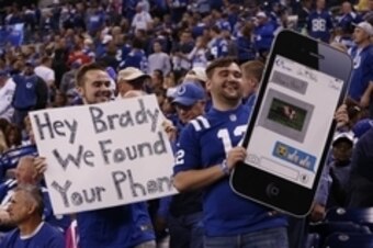 Oct 18, 2015; Indianapolis, IN, USA; Indianapolis Colts fans hold up signs referencing Deflategate in the first half during the NFL game against the New York Mets at Lucas Oil Stadium. Mandatory Credit: Brian Spurlock-USA TODAY Sports