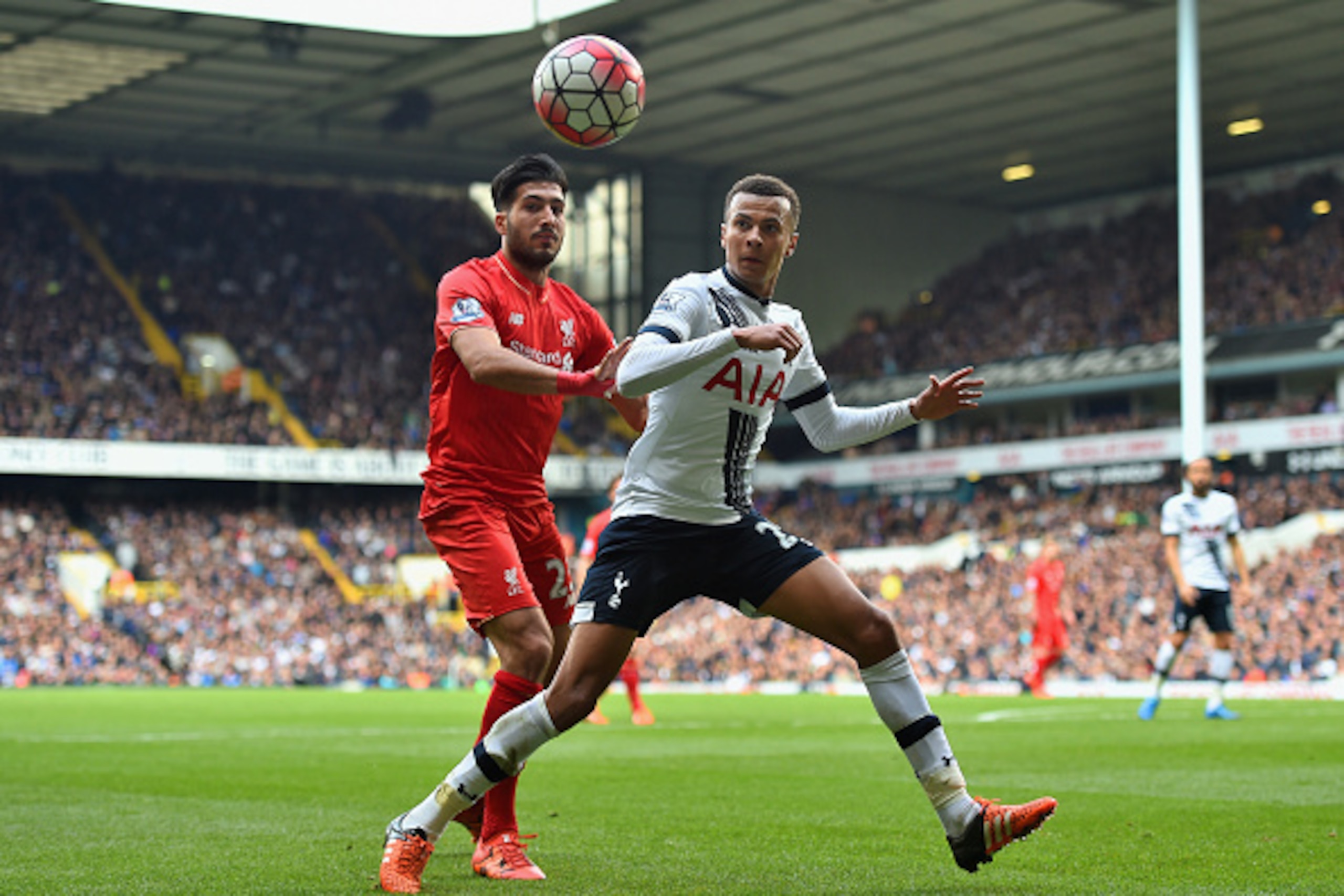 LONDON, ENGLAND - OCTOBER 17: Dele Alli of Tottenham Hotspur and Emre Can of Liverpool compete for the ball during the Barclays Premier League match between Tottenham Hotspur and Liverpool at White Hart Lane on October 17, 2015 in London, England.  (Photo