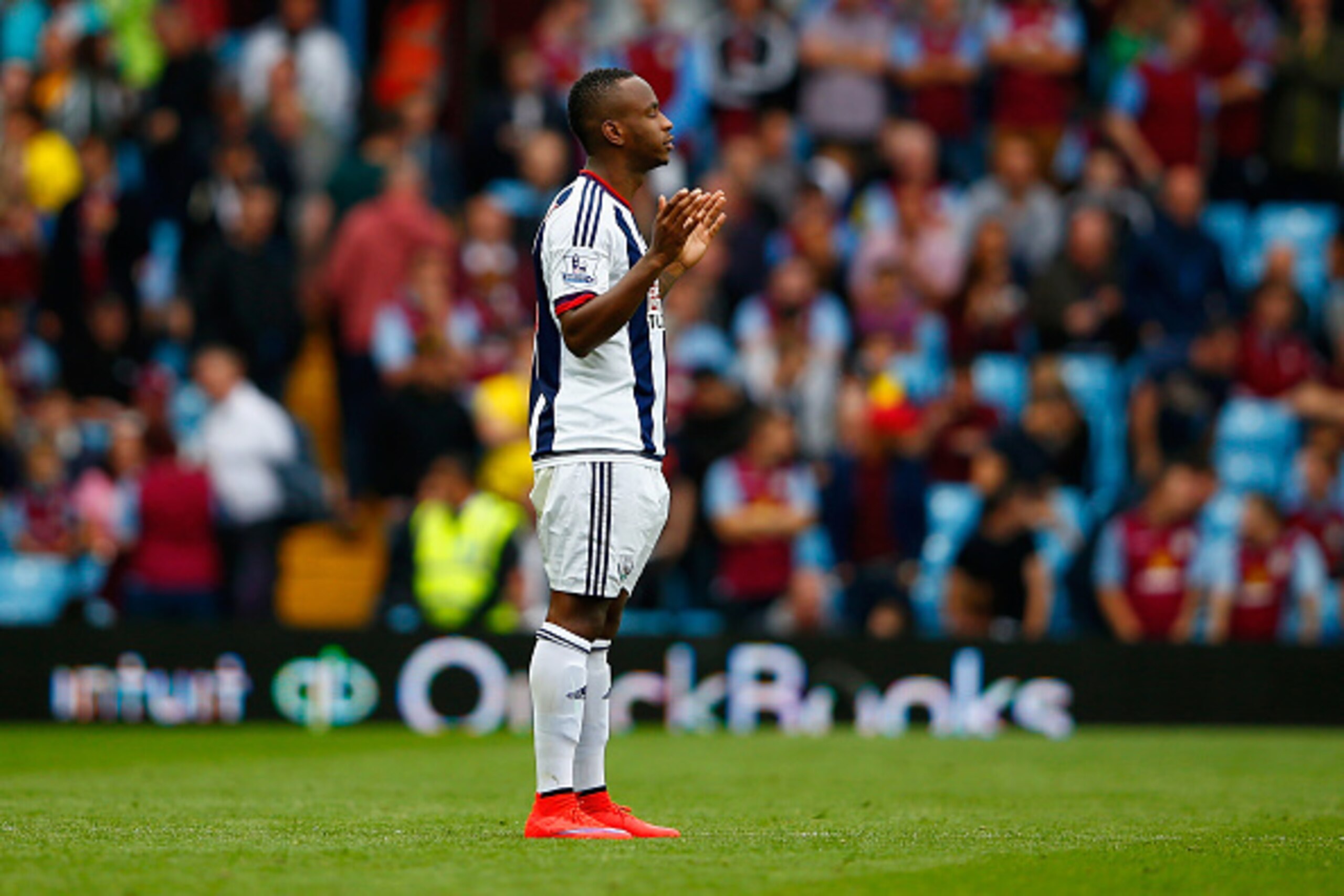 BIRMINGHAM, ENGLAND - SEPTEMBER 19: Saido Berahino of West Bromwich Albion prays before the start of the second half during the Barclays Premier League match between Aston Villa and West Bromwich Albion at Villa Park on September 19, 2015 in Birmingham, U
