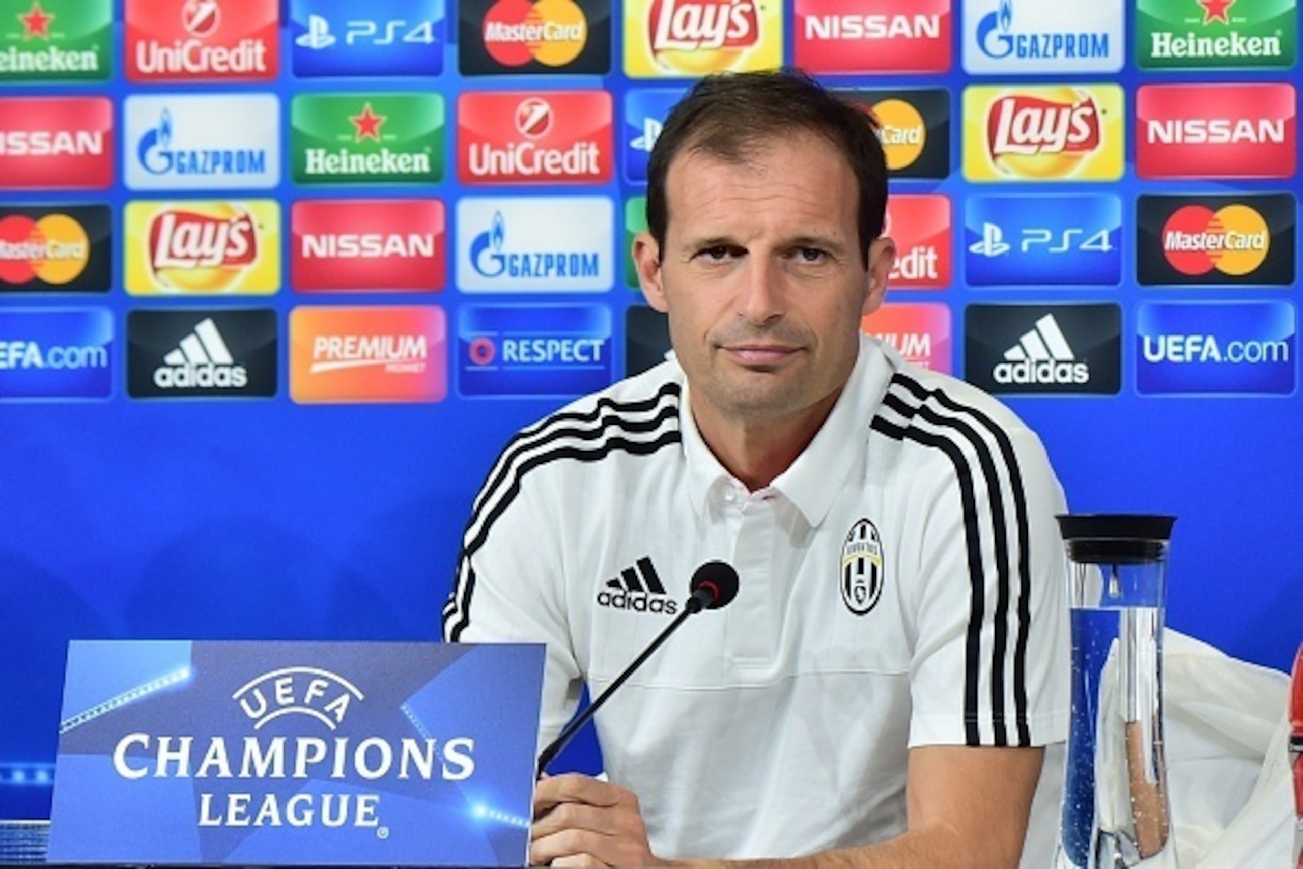 Juventus' coach from Italy Massimiliano Allegri attends a press conference on the eve of the Champions League football match Juventus vs Sevilla FC at  the 'Juventus Stadium ' on September 29, 2015 in Turin.  AFP PHOTO / GIUSEPPE CACACE        (Photo cred