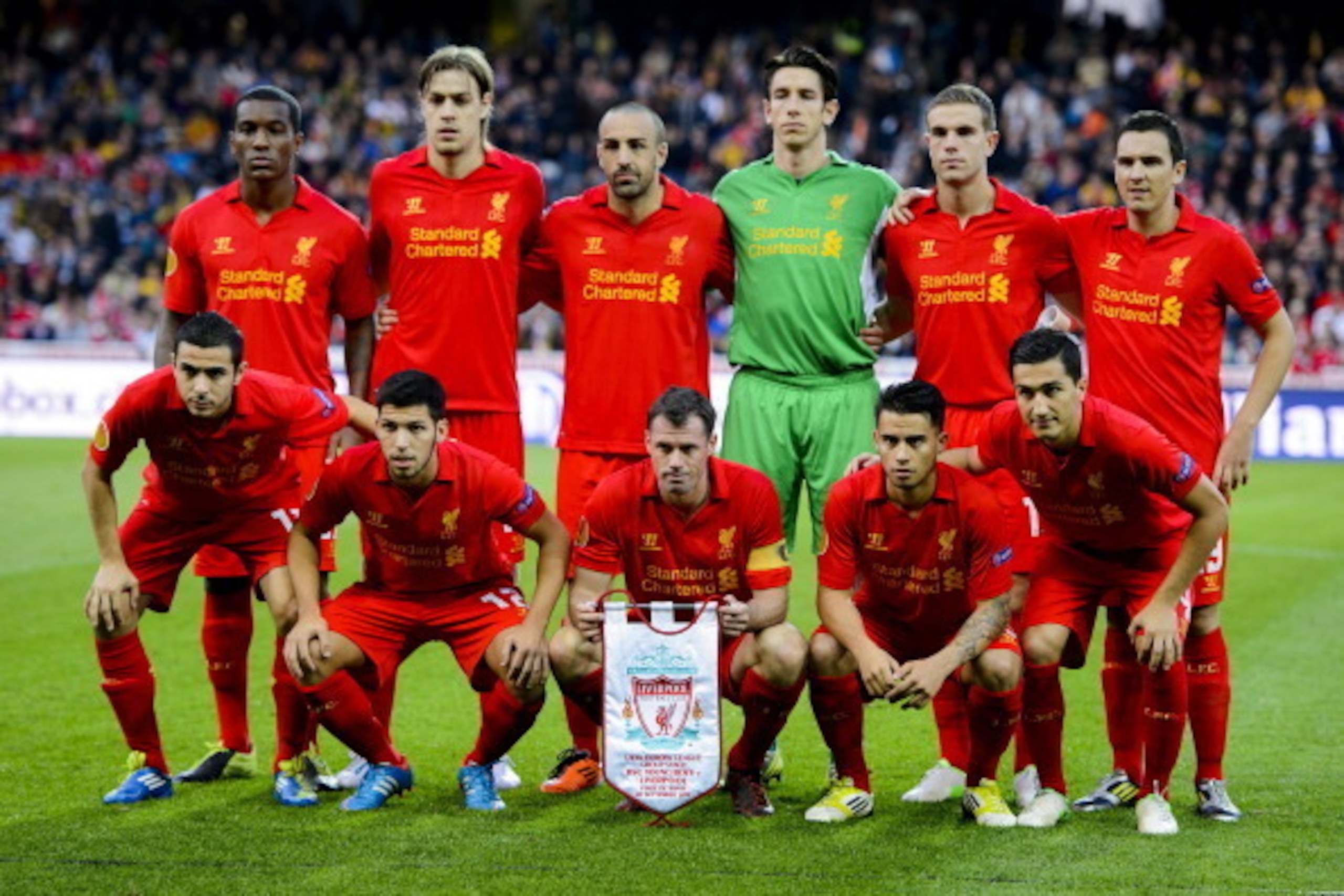 Liverpool team (L to R) front row: forward Oussama Assaidi, forward Daniel Pacheco, defender Jamie Carragher, forward Suso and midfielder Nuri Sahin. Second row: defender Andre Wisdom, defender Sebastian Coates, midfielder Jose Enrique, goalkeeper Brad Jo