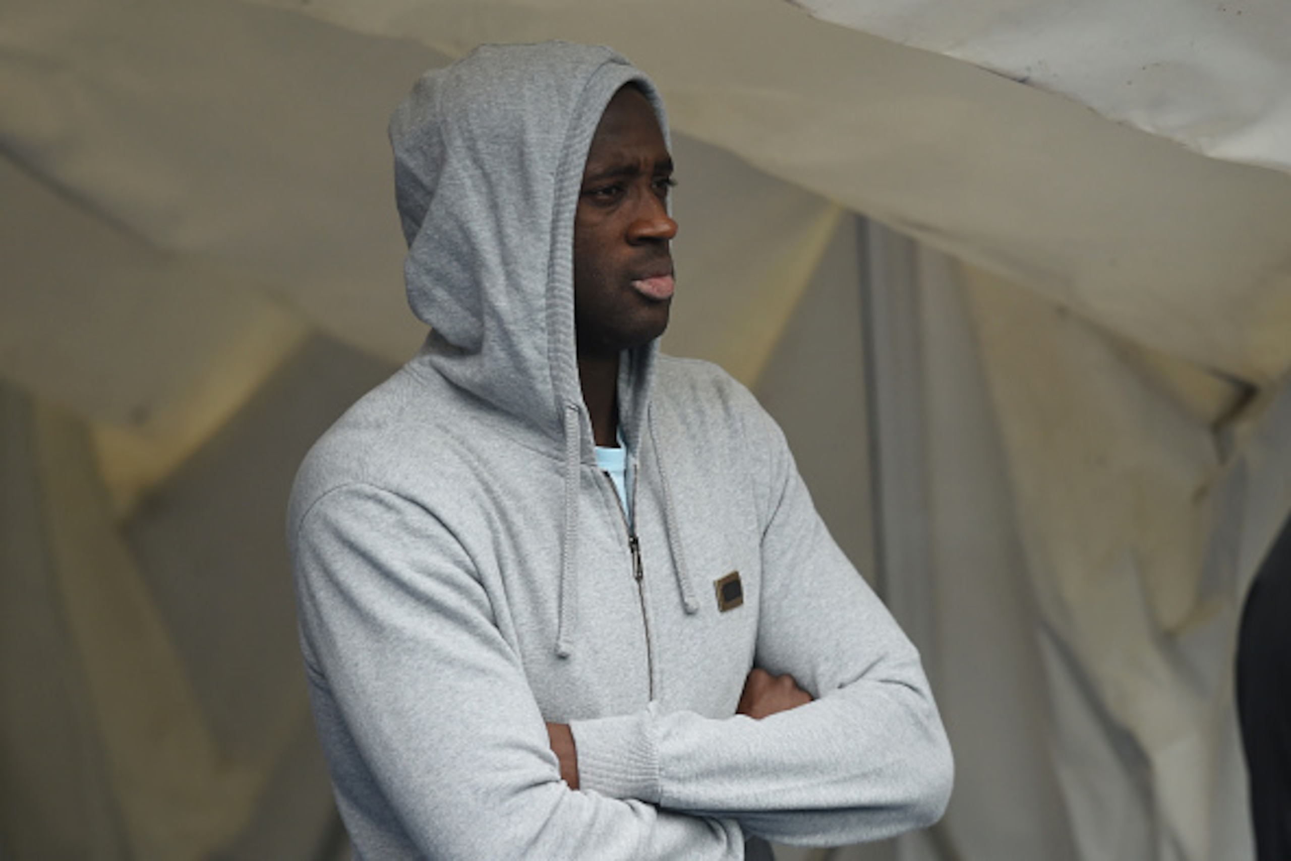 MANCHESTER, ENGLAND - OCTOBER 03: Yaya Toure of Manchester Coity looks on from the tunnel before the Barclays Premier League match between Manchester City and Newcastle United at Etihad Stadium on October 3, 2015 in Manchester, United Kingdom.  (Photo by 