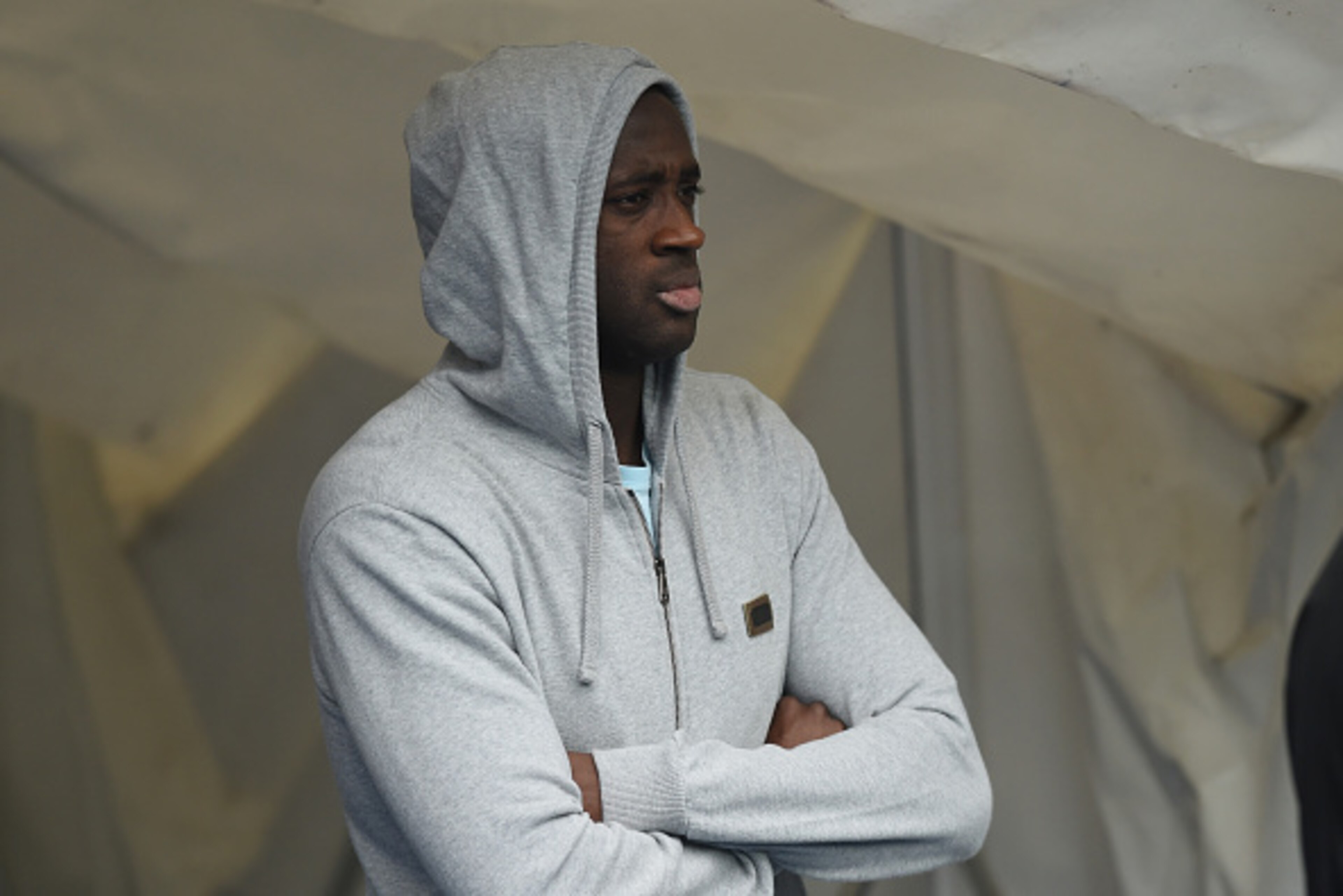 MANCHESTER, ENGLAND - OCTOBER 03: Yaya Toure of Manchester Coity looks on from the tunnel before the Barclays Premier League match between Manchester City and Newcastle United at Etihad Stadium on October 3, 2015 in Manchester, United Kingdom.  (Photo by 