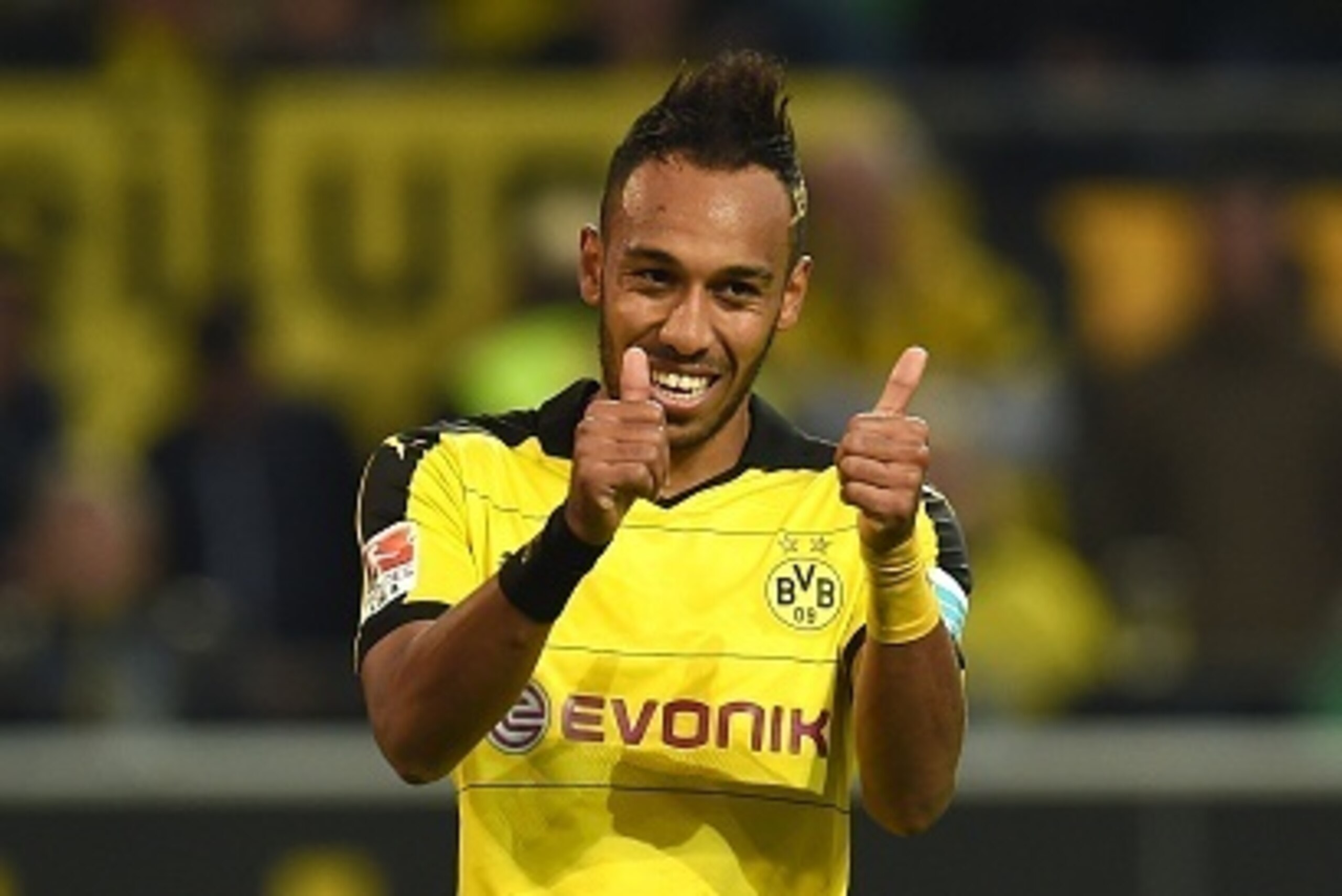 Dortmund's Gabonese striker Pierre-Emerick Aubameyang reacts during the German first division Bundesliga football match Borussia Dortmund v SV Darmstadt 98, in Dortmund, western Germany, on September 27, 2015. The match ended with a 2-2 draw. AFP PHOTO / 