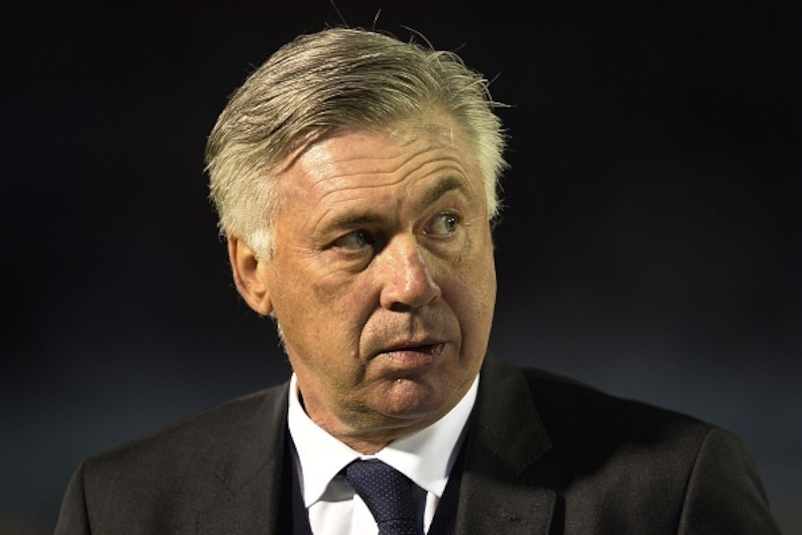 Real Madrid's Italian coach Carlo Ancelotti looks on at the end of the first half of the Spanish league football match Celta Vigo vs  Real Madrid CF at the Balaidos stadium in Vigo on April 26, 2015. Real Madrid won 4-2.   AFP PHOTO/ MIGUEL RIOPA        (