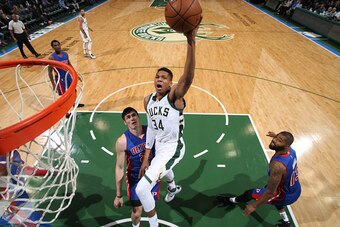MILWAUKEE, WI - OCTOBER 10:  Giannis Antetokounmpo #34 of the Milwaukee Bucks goes to the basket against the Detroit Pistons on October 10, 2015 at the BMO Harris Bradley Center in Milwaukee, Wisconsin. NOTE TO USER: User expressly acknowledges and agrees