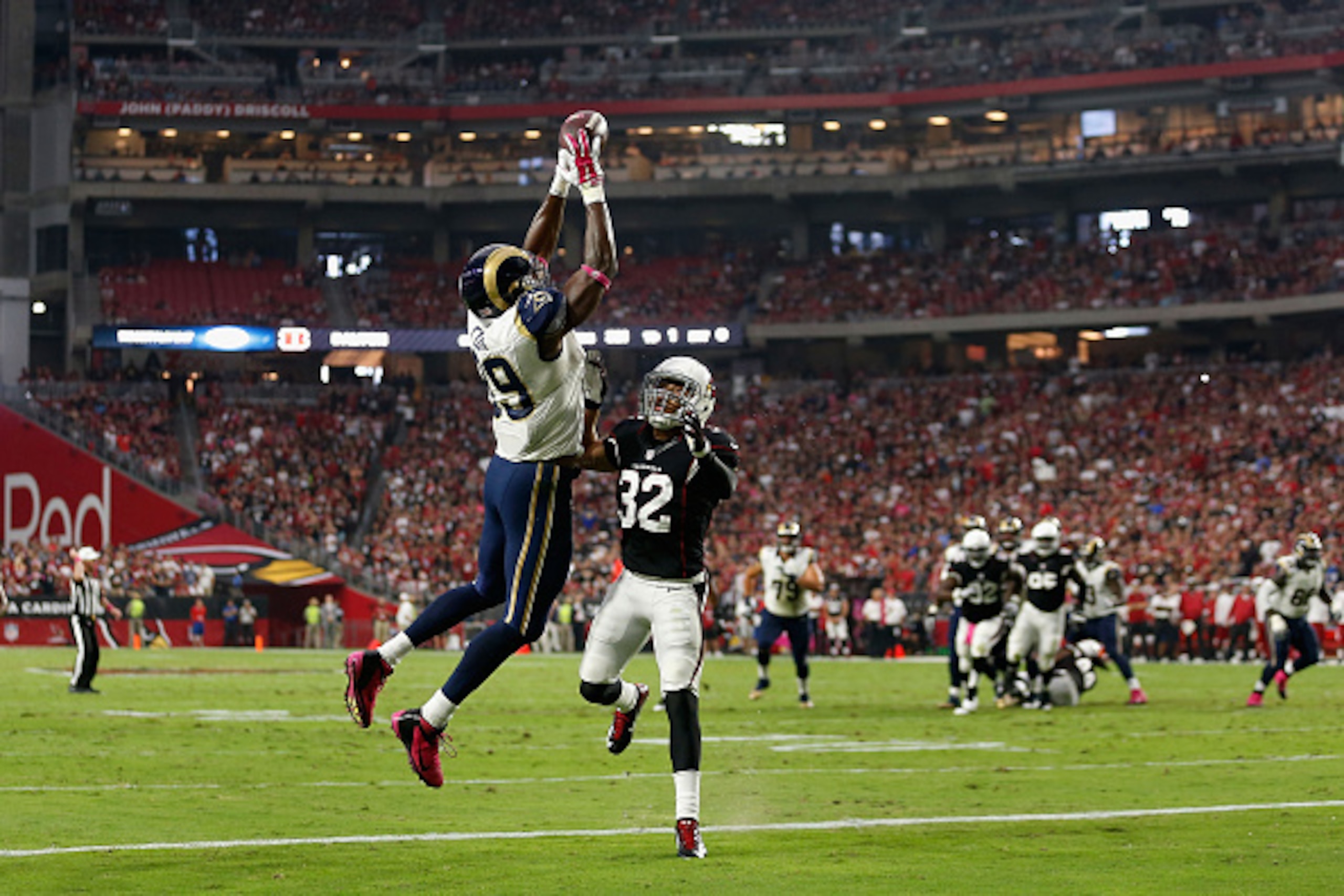 GLENDALE, AZ - OCTOBER 04: Tight end Jared Cook #89 of the St. Louis Rams can't haul in a pass while being defended by free safety Tyrann Mathieu #32 of the Arizona Cardinals  during the NFL game at the University of Phoenix Stadium on October 4, 2015 in 