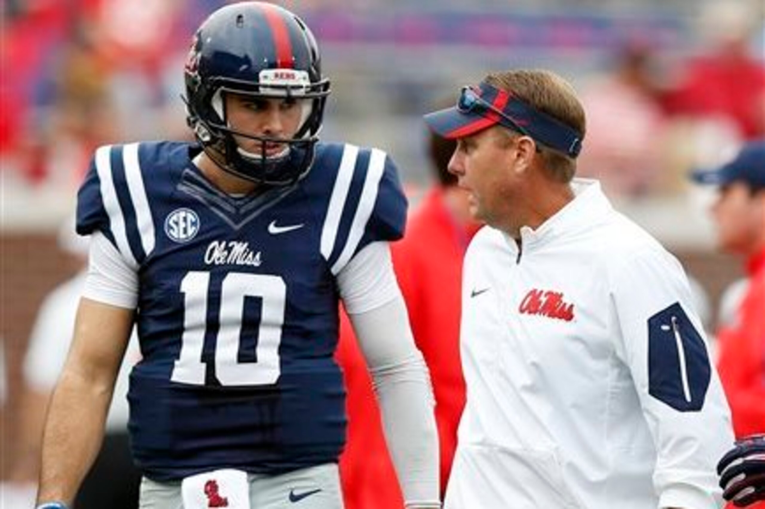 Ole Miss QB Chad Kelly (left) and head coach Hugh Freeze