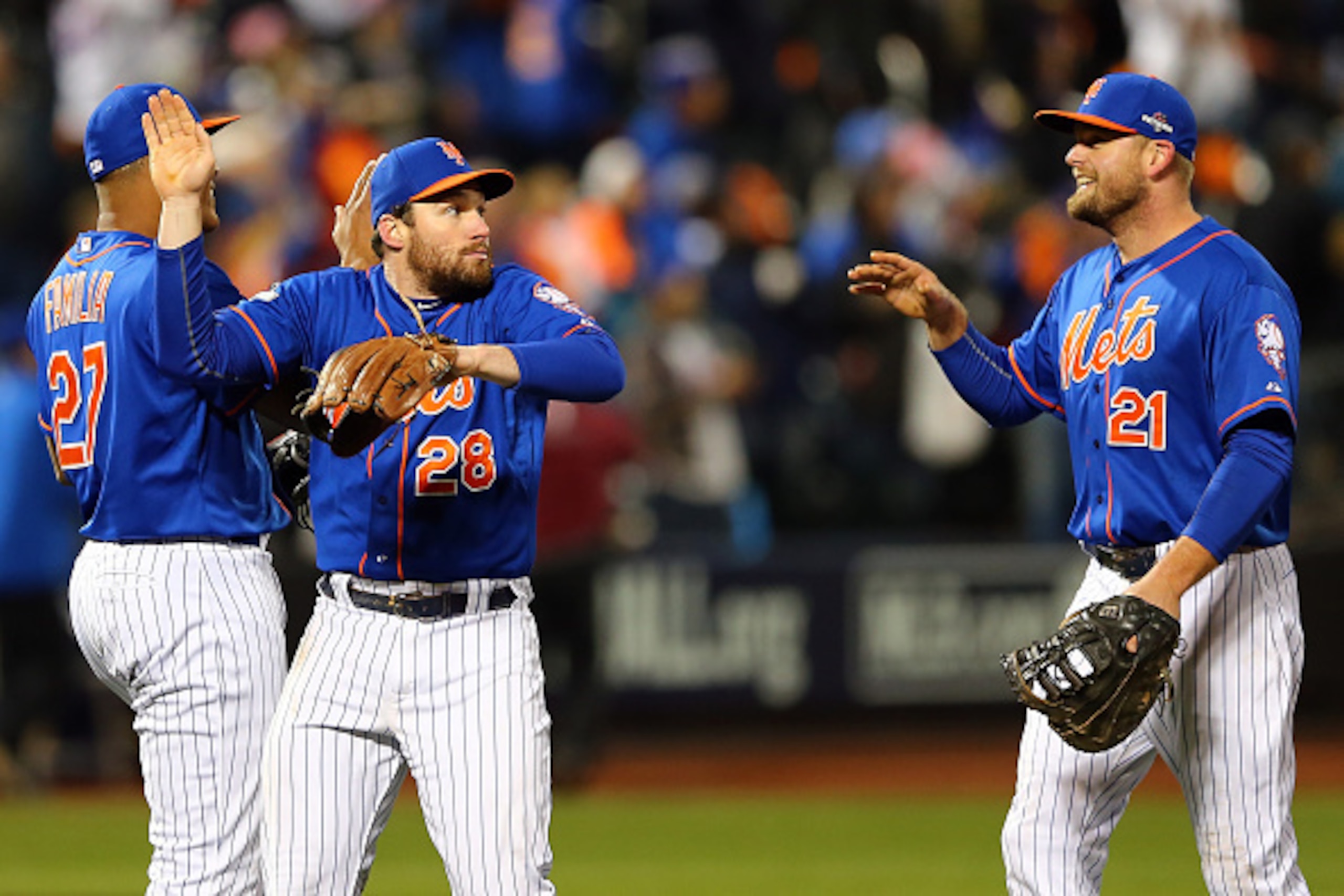 NEW YORK, NY - OCTOBER 18: Daniel Murphy #28, Jeurys Familia #27 and Lucas Duda #21 of the New York Mets celebrate after defeating the Chicago Cubs in game two of the 2015 MLB National League Championship Series at Citi Field on October 18, 2015 in the F NEW YORK, NY - OCTOBER 18: Daniel Murphy #28, Jeurys Familia #27 and Lucas Duda #21 of the New York Mets celebrate after defeating the Chicago Cubs in game two of the 2015 MLB National League Championship Series at Citi Field on October 18, 2015 in the F