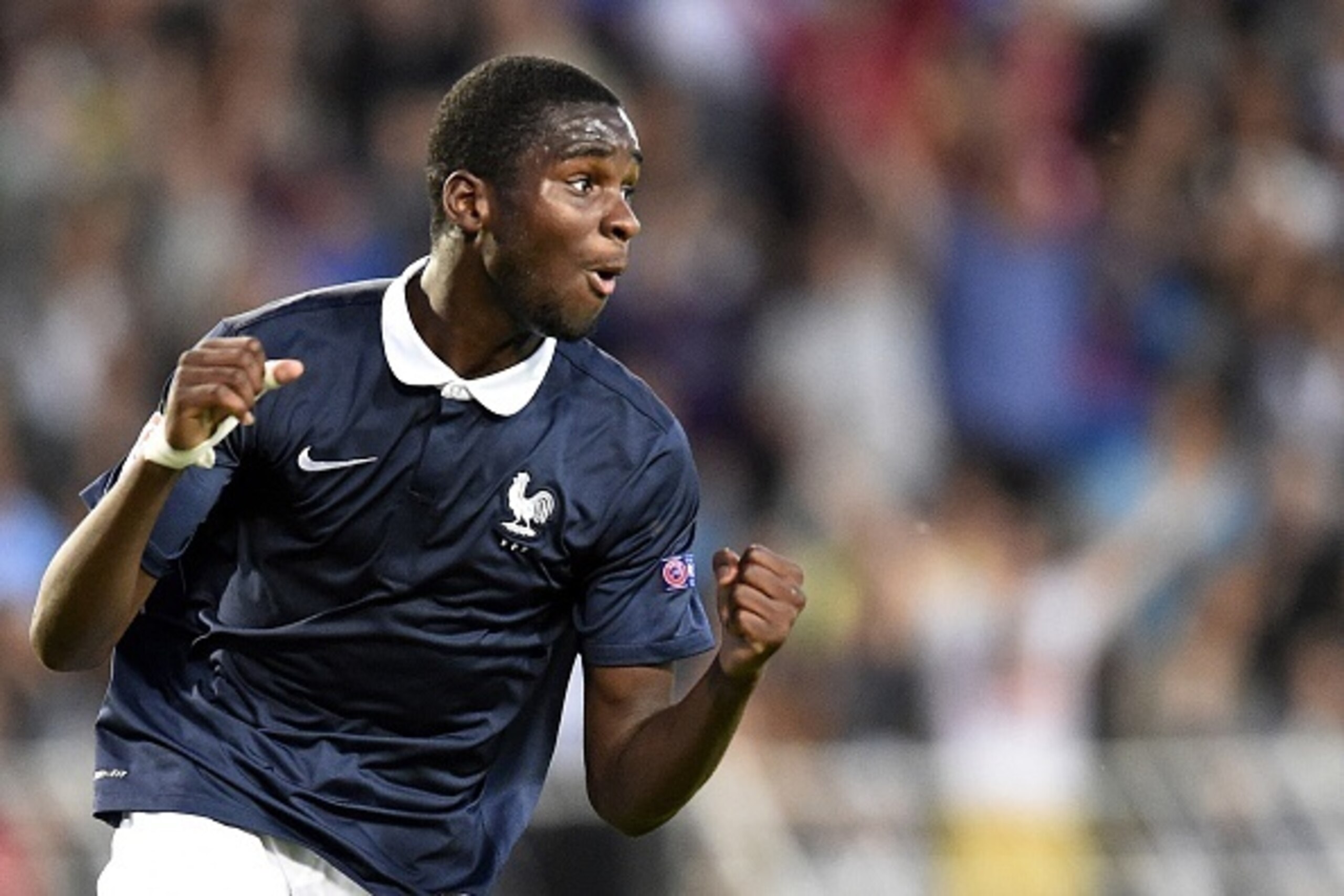France's forward Odsonne Edouard celebrates after scoring a goal during the 2015 UEFA Euro Cup final football match between France and Germany in Burgas on May 22, 2015.  AFP PHOTO / DIMITAR DILKOFF        (Photo credit should read DIMITAR DILKOFF/AFP/Get