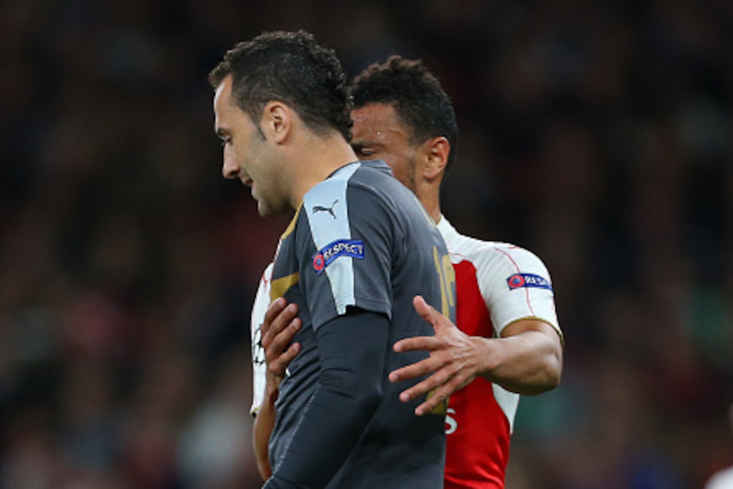 LONDON, ENGLAND - SEPTEMBER 29:  Francis Coquelin of Arsenal consoles a dejected David Ospina of Arsenal during the UEFA Champions League match between Arsenal and Olympiacos at the Emirates Stadium on September 29, 2015 in London, United Kingdom.  (Photo