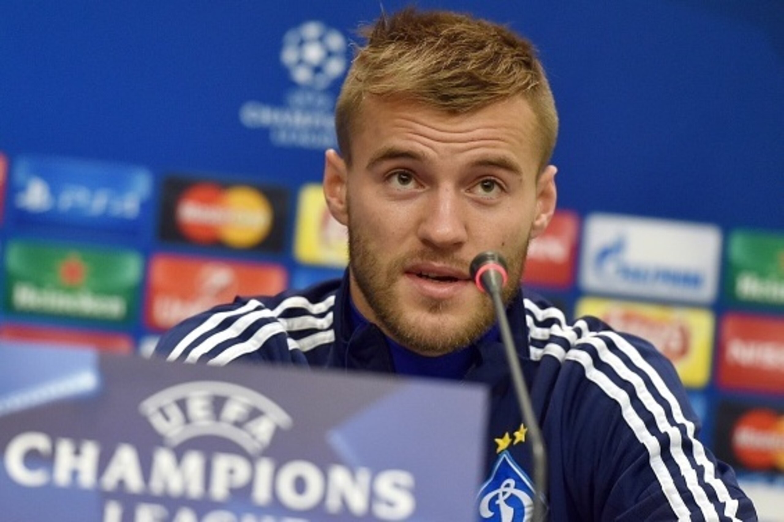FC Dynamo Kiev's  midfielder Andriy Yarmolenko speaks during a press conference at the training base near Kiev on October 19, 2015, a day before Champion's League Group G football match between FC Dynamo and Chelsea FC. AFP PHOTO / GENYA SAVILOV        (P
