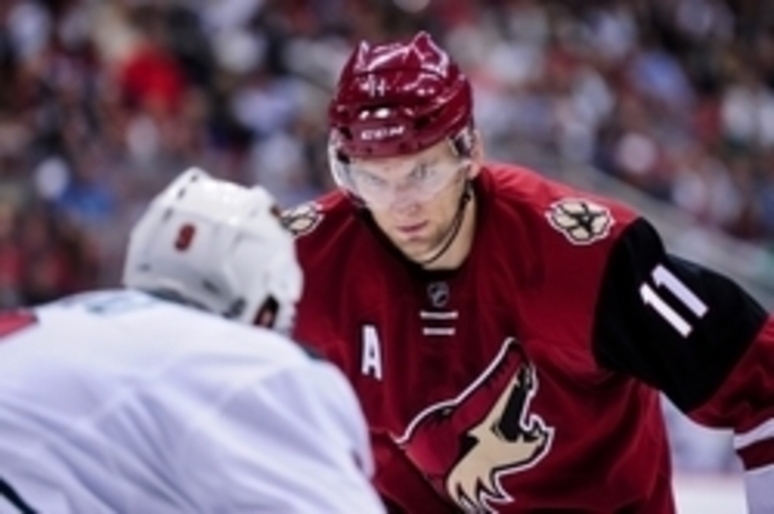Oct 15, 2015; Glendale, AZ, USA; Arizona Coyotes center Martin Hanzal (11) stares down Minnesota Wild center Mikko Koivu (9) prior to a face off in the second period at Gila River Arena. Mandatory Credit: Matt Kartozian-USA TODAY Sports Oct 15, 2015; Glendale, AZ, USA; Arizona Coyotes center Martin Hanzal (11) stares down Minnesota Wild center Mikko Koivu (9) prior to a face off in the second period at Gila River Arena. Mandatory Credit: Matt Kartozian-USA TODAY Sports
