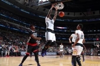 Apr 1, 2015; Chicago, IL, USA;  McDonalds High School All American West boys forward Caleb Swanigan (50) dunks during the McDonalds High School All American Games at the United Center. Mandatory Credit: Brian Spurlock-USA TODAY Sports