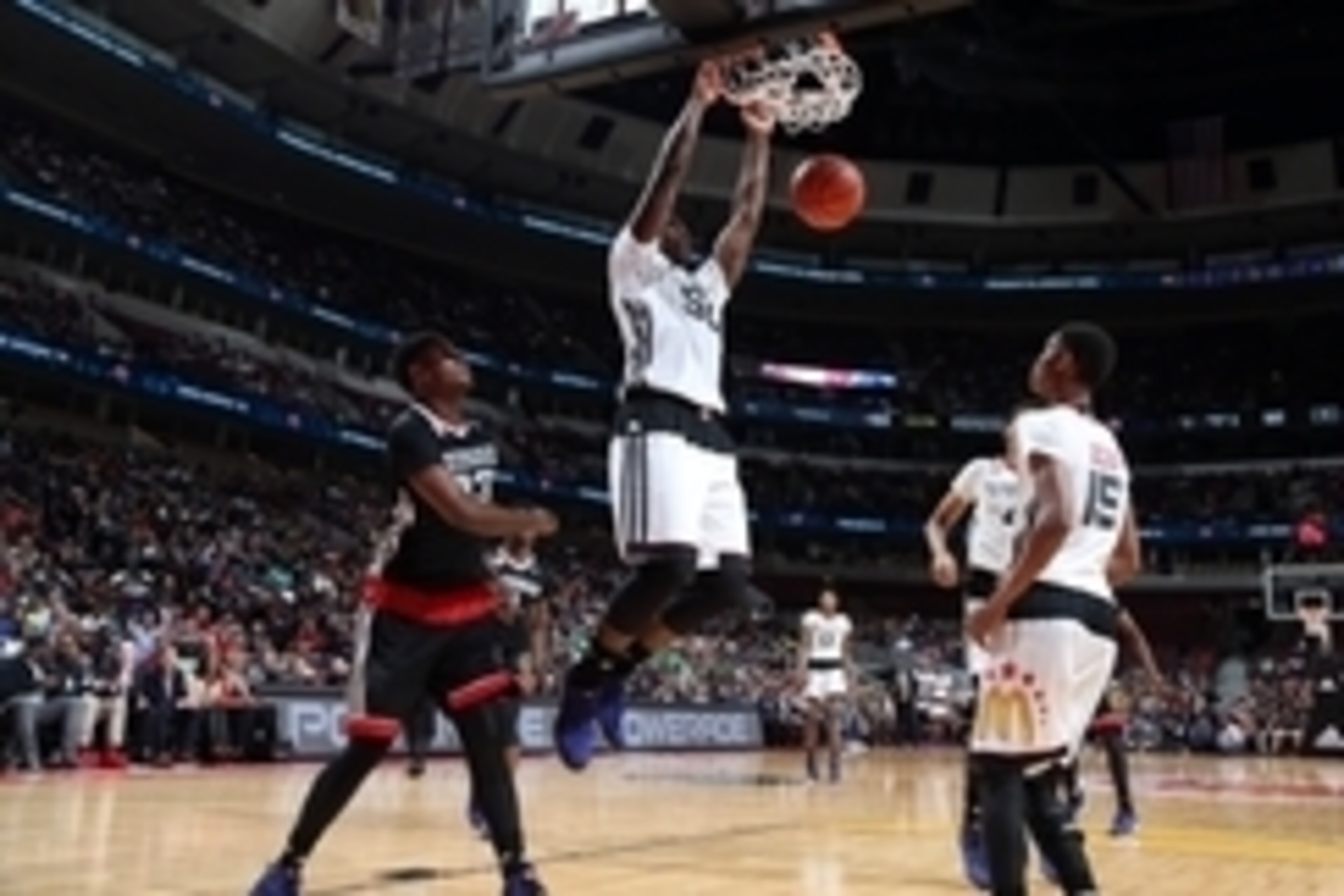 Apr 1, 2015; Chicago, IL, USA;  McDonalds High School All American West boys forward Caleb Swanigan (50) dunks during the McDonalds High School All American Games at the United Center. Mandatory Credit: Brian Spurlock-USA TODAY Sports