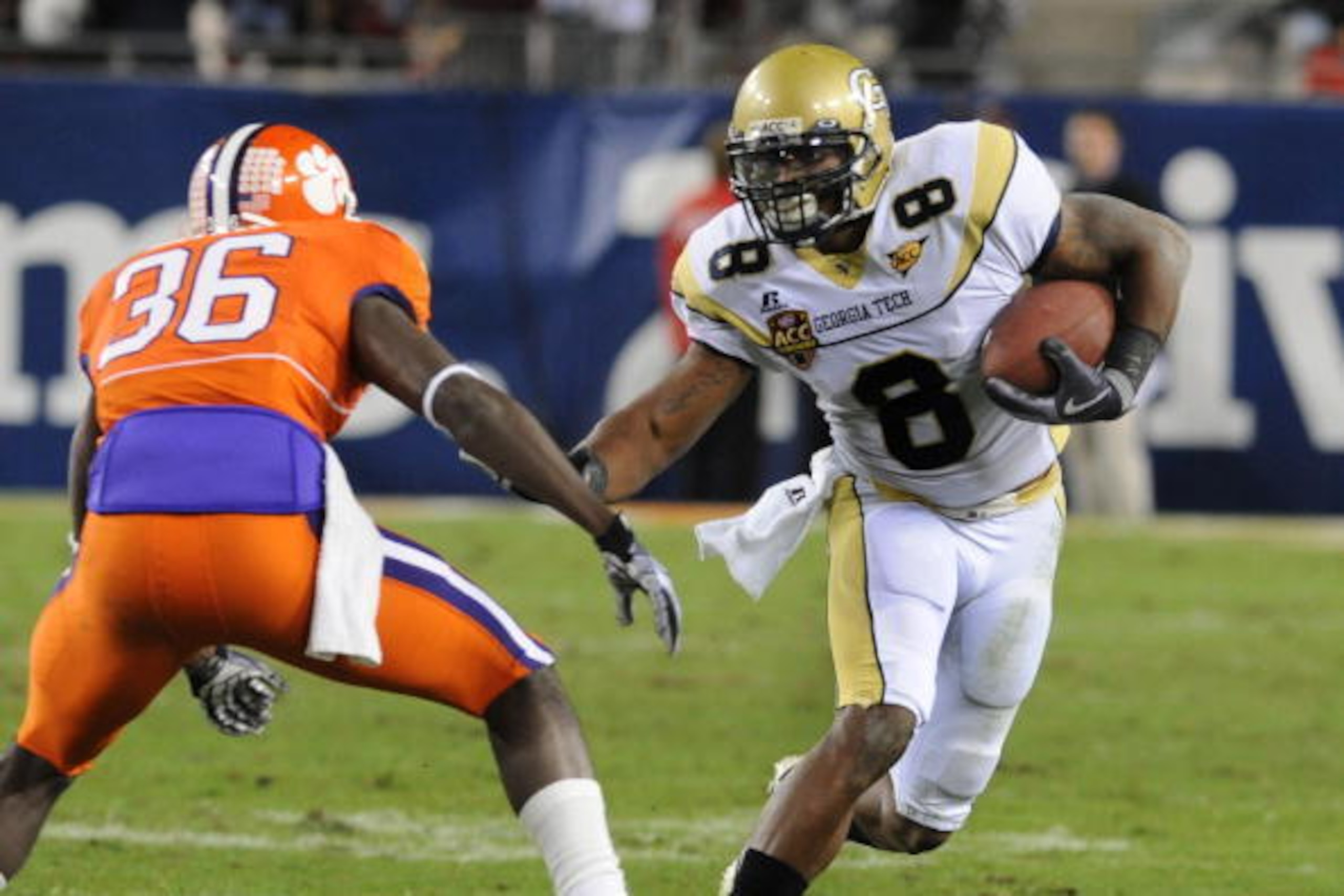 TAMPA, FL - NOVEMBER 28:  Wide receiver Demaryius Thomas #8 of the Georgia Tech Yellow Jackets rushes upfield against the Clemson Tigers in the 2009 ACC Football Championship Game at Raymond James Stadium on December 5, 2009 in Tampa, Florida.  (Photo by 