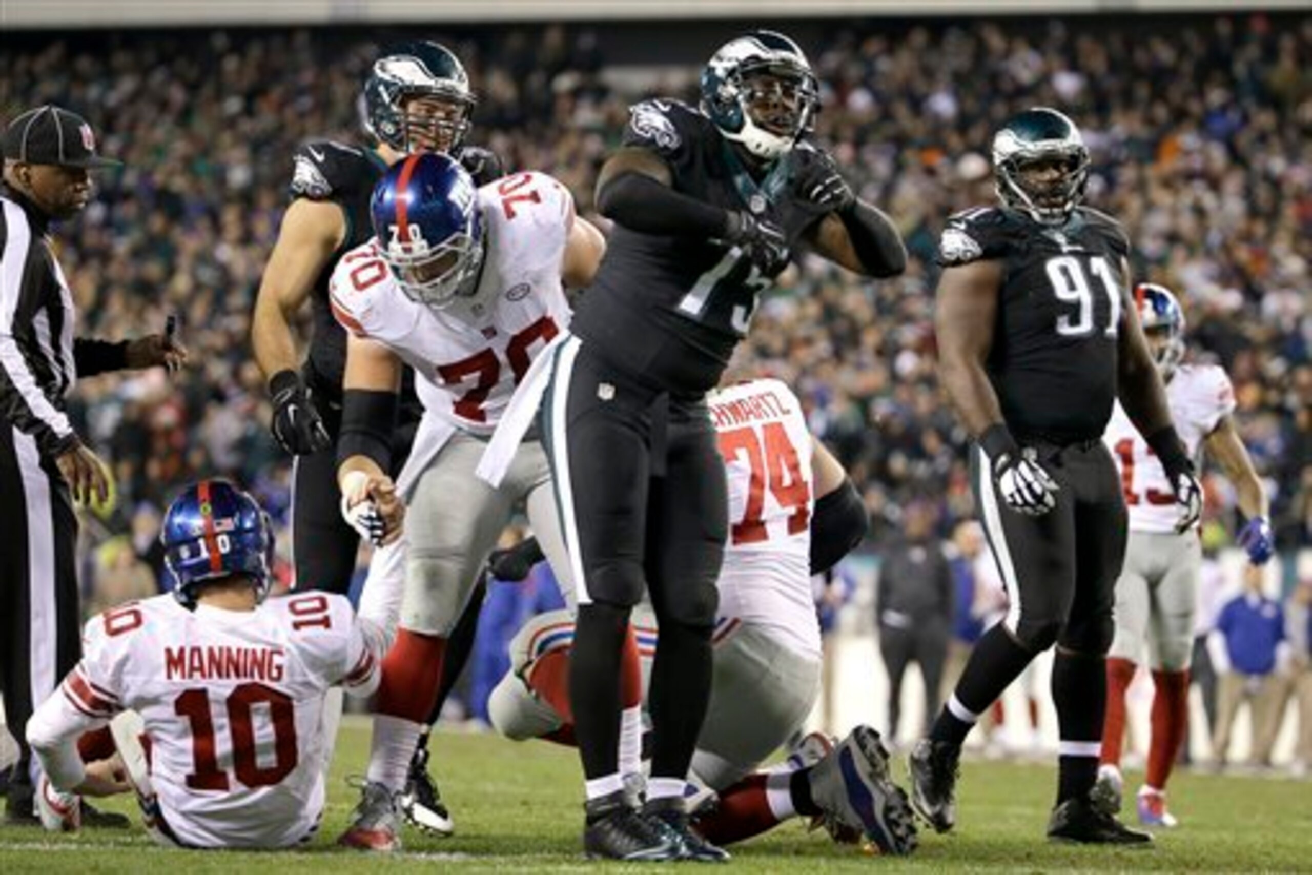 Eli Manning spent a lot of time on the ground behind a leaky offensive line.