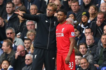 LONDON, ENGLAND - OCTOBER 17:  Jurgen Klopp manager of Liverpool talks to Jordon Ibe of Liverpool during the Barclays Premier League match between Tottenham Hotspur and Liverpool at White Hart Lane on October 17, 2015 in London, England.  (Photo by Cather