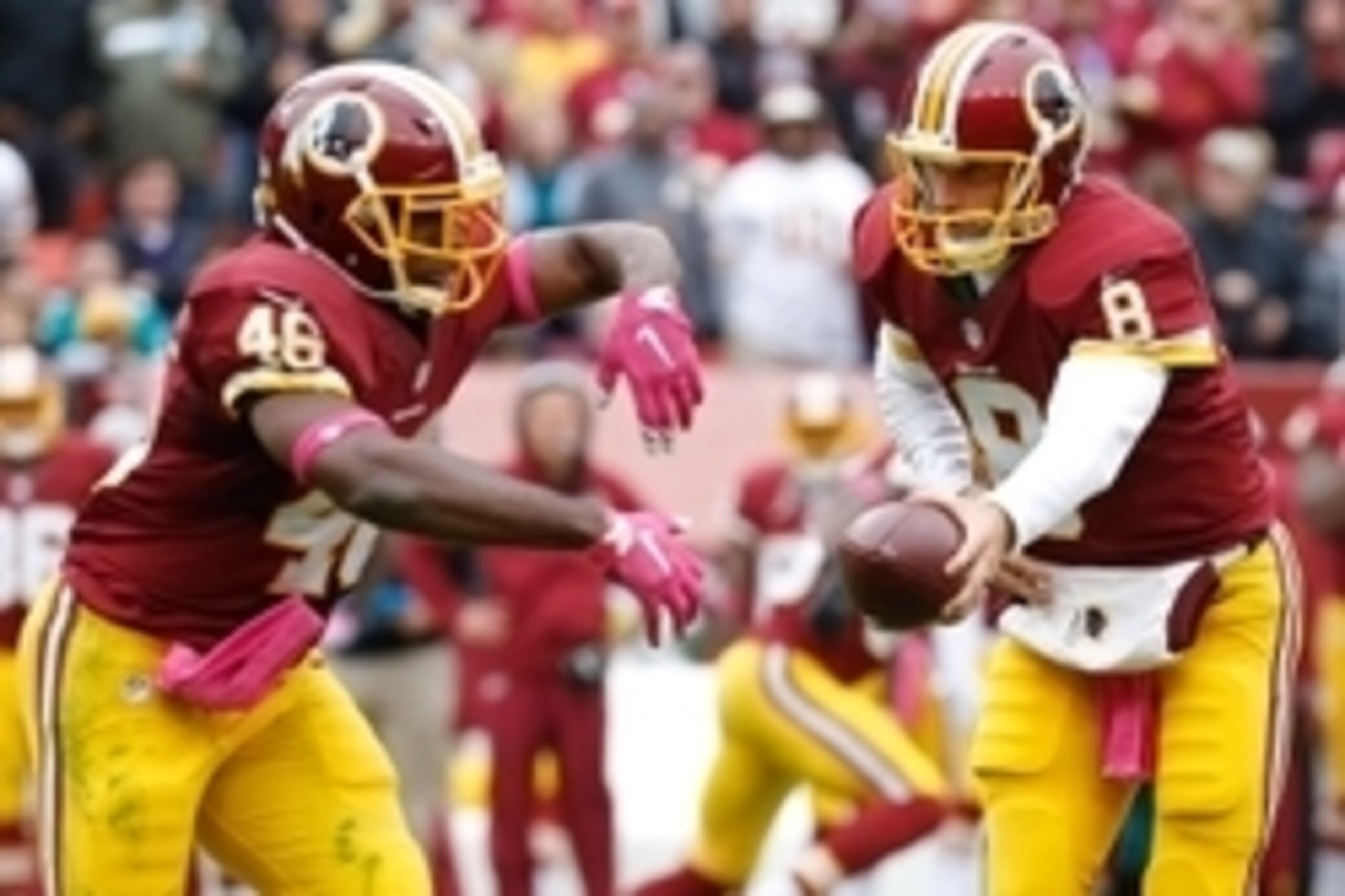 Oct 4, 2015; Landover, MD, USA; Washington Redskins quarterback Kirk Cousins (8) prepares to hand the ball off to Redskins running back Alfred Morris (46) against the Philadelphia Eagles at FedEx Field. Mandatory Credit: Geoff Burke-USA TODAY Sports