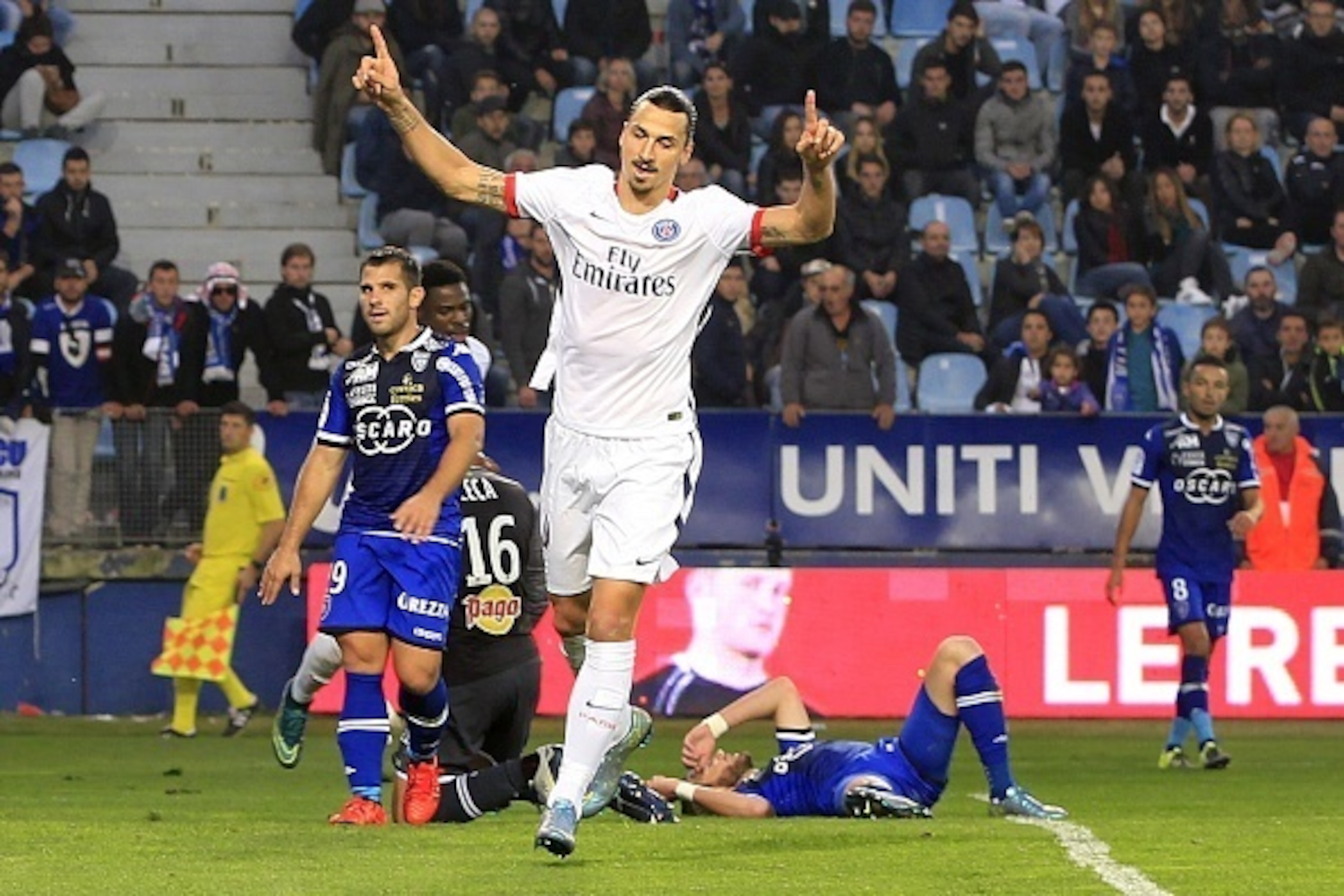Paris Saint-Germain's Swedish forward Zlatan Ibrahimovic celebrates after scoring during the L1 football match Bastia (SCB) against Paris (PSG) on October 17, 2015, at the Armand Cesari stadium in Bastia, on the French Mediterranean island of Corsica.  AF