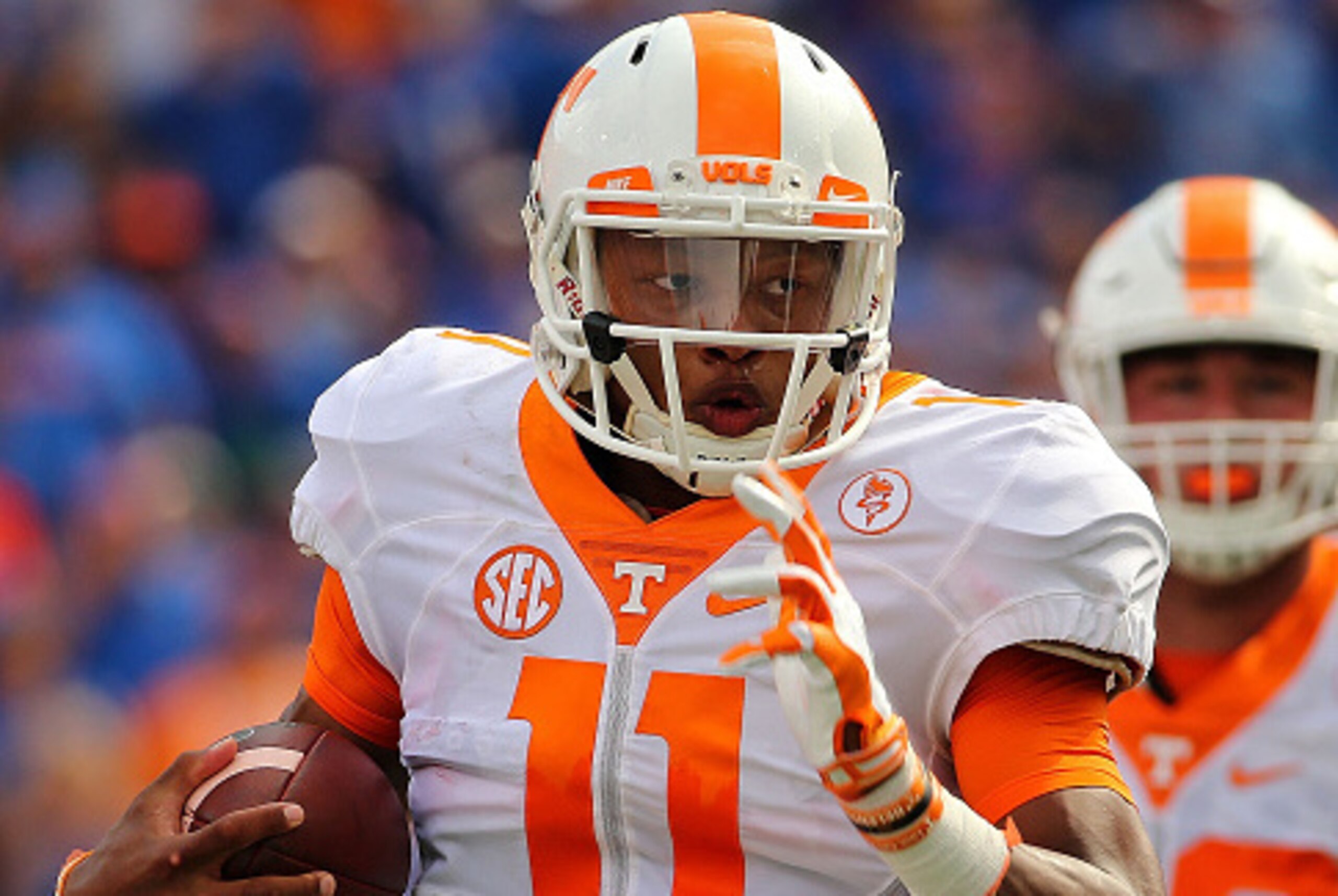 GAINESVILLE, FL - SEPTEMBER 26:  Joshua Dobbs #11 of the Tennessee Volunteers rushes for a touchdown during a game against the Florida Gators at Ben Hill Griffin Stadium on September 26, 2015 in Gainesville, Florida.  (Photo by Mike Ehrmann/Getty Images)