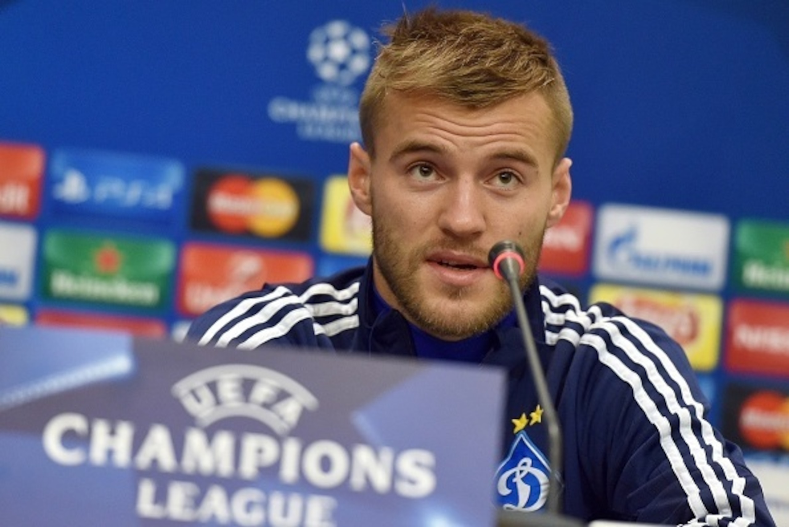 FC Dynamo Kiev's  midfielder Andriy Yarmolenko speaks during a press conference at the training base near Kiev on October 19, 2015, a day before Champion's League Group G football match between FC Dynamo and Chelsea FC. AFP PHOTO / GENYA SAVILOV        (P