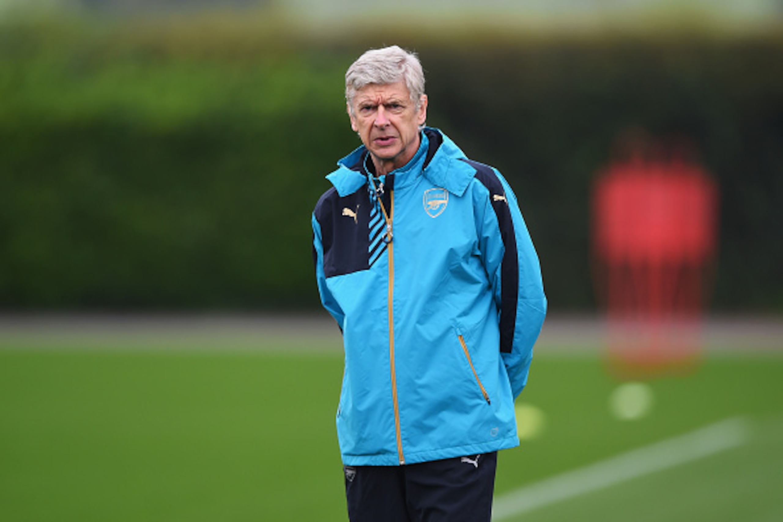 ST ALBANS, ENGLAND - OCTOBER 19:  Arsene Wenger, manager of Arsenal looks on during an Arsenal training session ahead of the UEFA Champions League match against Bayern Munich at London Colney on October 19, 2015 in St Albans, England.  (Photo by Shaun Bot