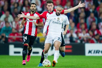 BILBAO, SPAIN - SEPTEMBER 23:  Isco of Real Madrid CF duels for the ball with Aimeric Laporte of Athletic Club Bilbao during the La Liga match between Athletic Club Bilbao and Real Madrid CF at San Mames Stadium on September 23, 2015 in Bilbao, Spain.  (P