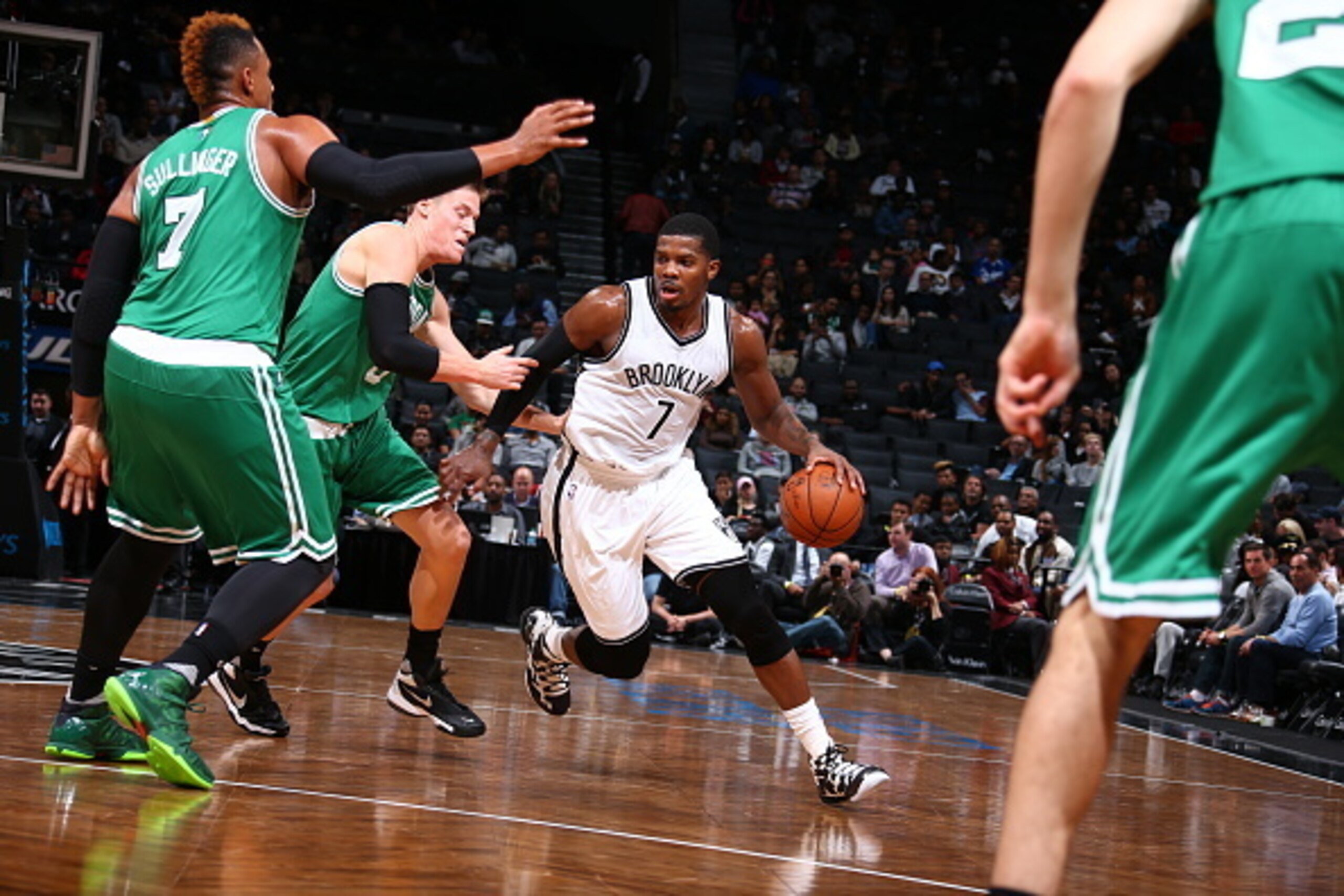 BROOKLYN, NY - OCTOBER 14: Joe Johnson #7 of the Brooklyn Nets drives to the basket against the Boston Celtics during the preseason game on October 14, 2015 at Barclays Center in Brooklyn, New York. NOTE TO USER: User expressly acknowledges and agrees tha