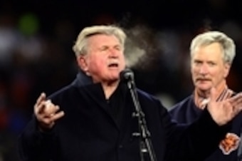 Dec 9, 2013; Chicago, IL, USA; Chicago Bears former  player and coach Mike Ditka (left) is honored during halftime during an NFL game between the Dallas Cowboys and Chicago Bears at Soldier Field. Mandatory Credit: Andrew Weber-USA TODAY Sports